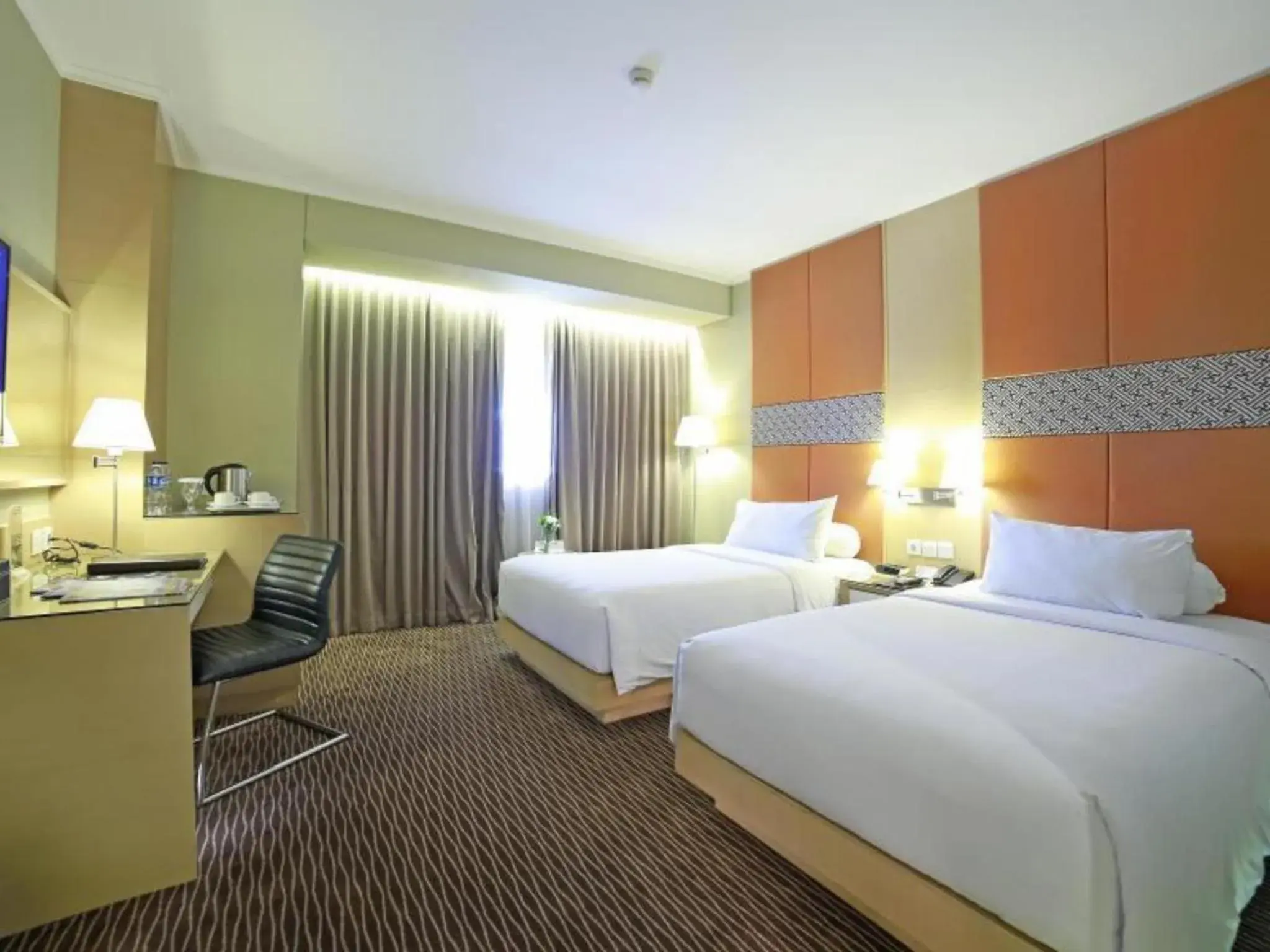 Bed in All Sedayu Hotel Kelapa Gading