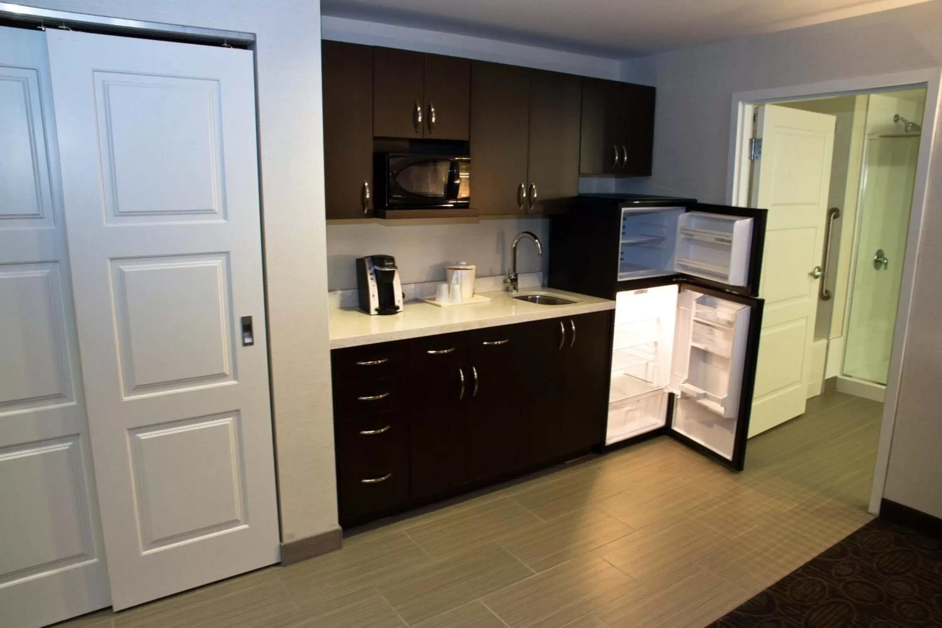 Photo of the whole room, Kitchen/Kitchenette in Holiday Inn Hotel & Suites Red Deer, an IHG Hotel