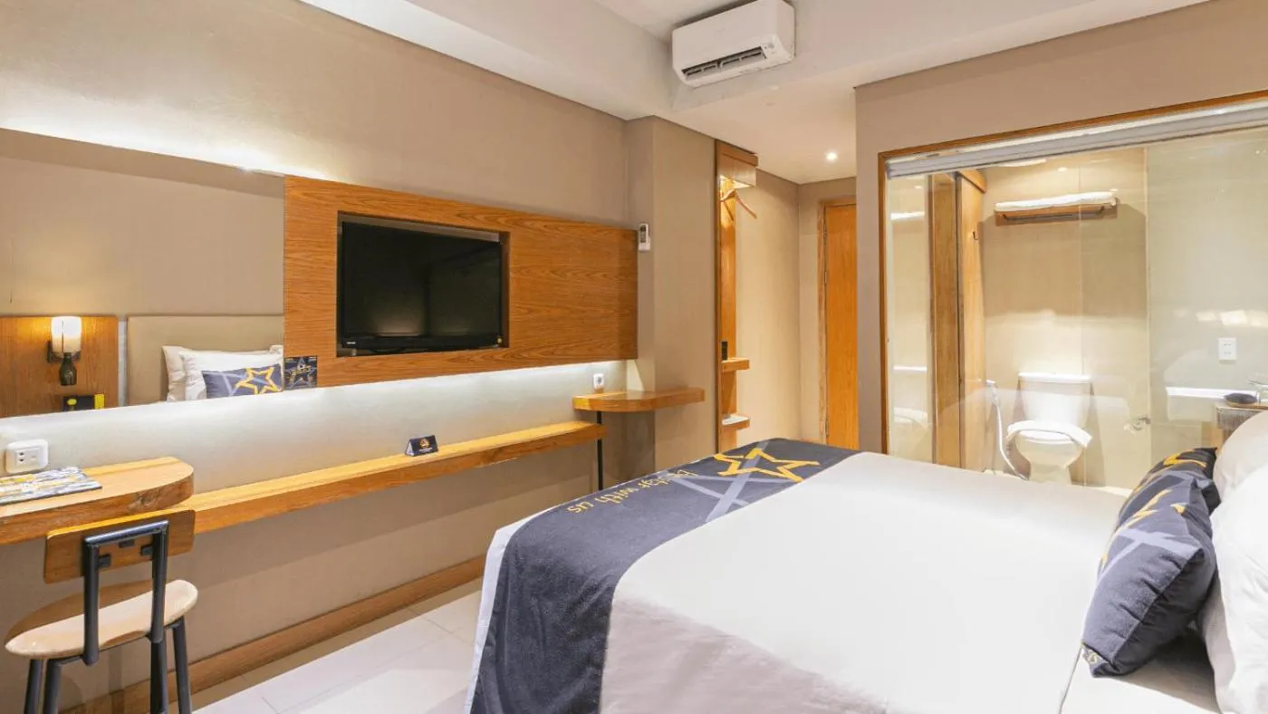 Bed in Yellow Star Ambarukmo Hotel