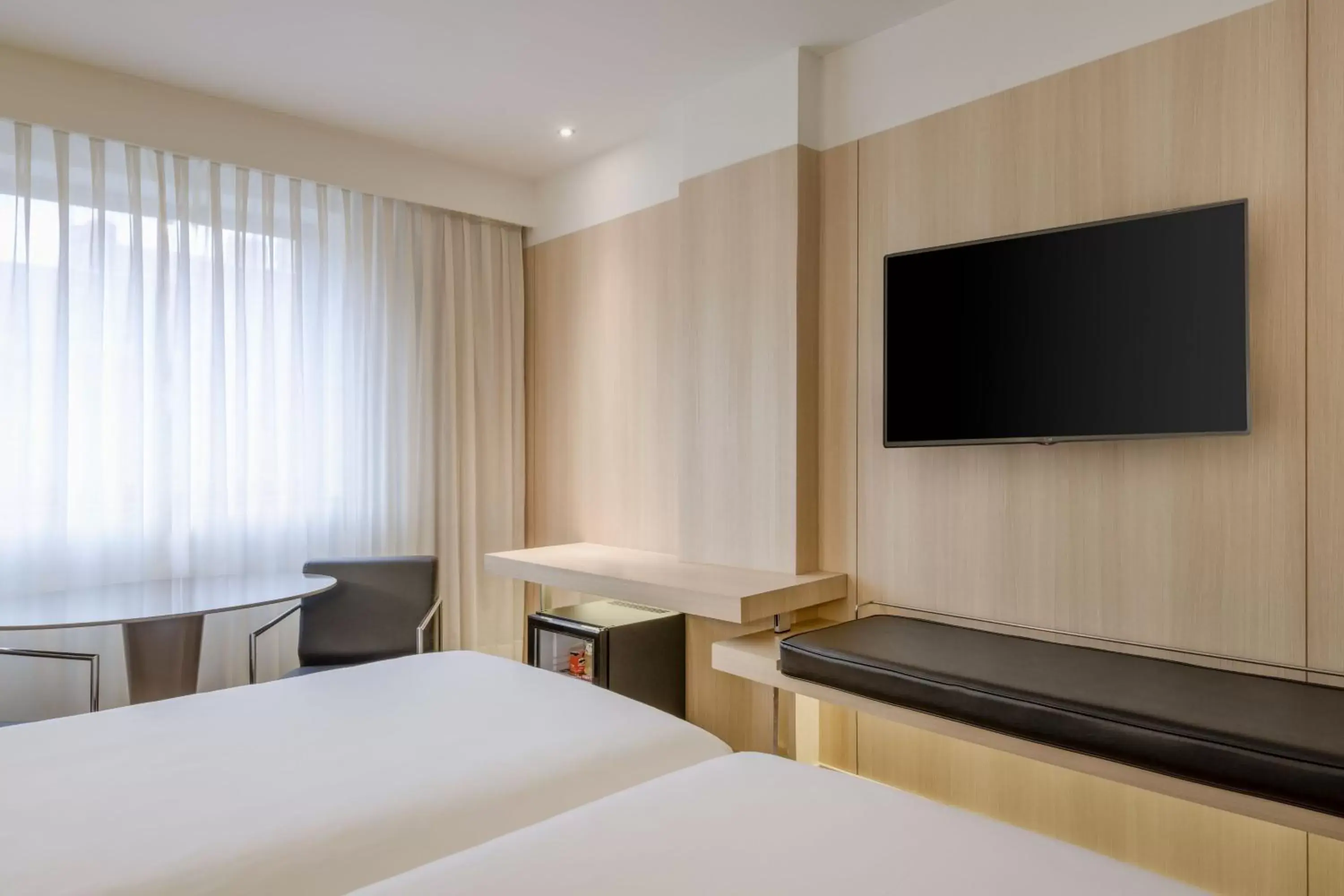 Photo of the whole room, TV/Entertainment Center in AC Hotel Córdoba by Marriott