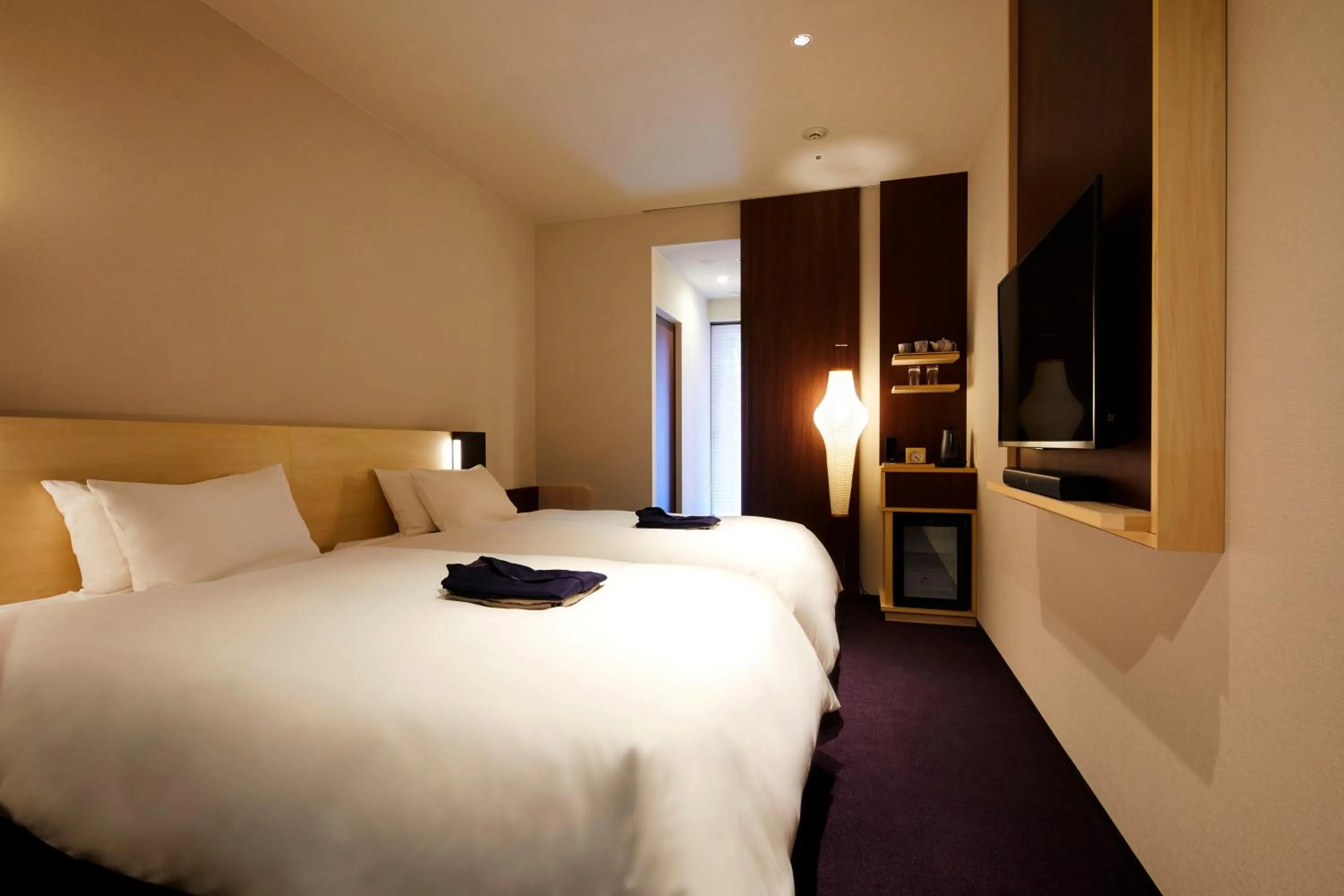 Photo of the whole room, Bed in HOTEL AMANEK Kanazawa