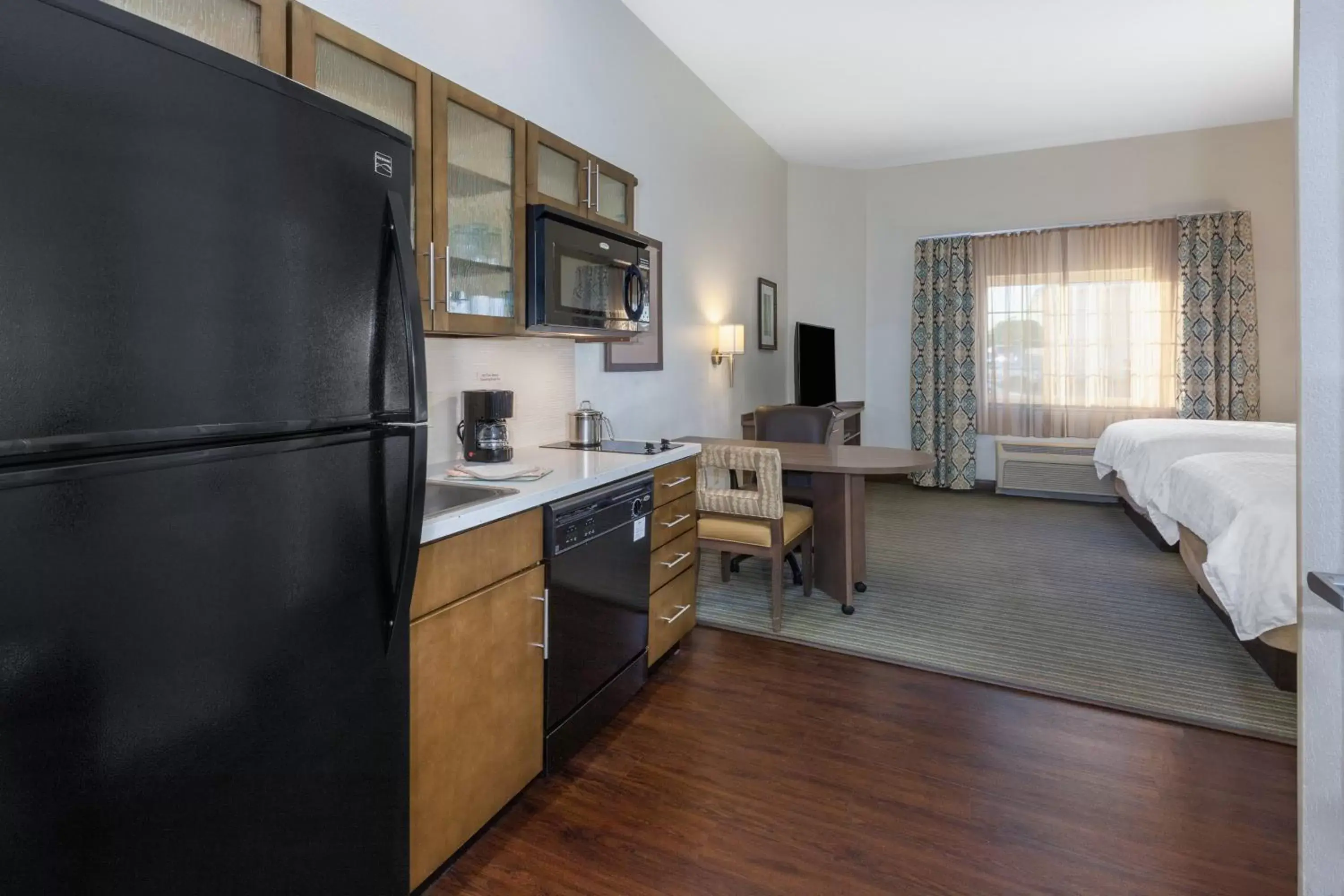 Photo of the whole room, Kitchen/Kitchenette in Candlewood Suites-West Springfield, an IHG Hotel