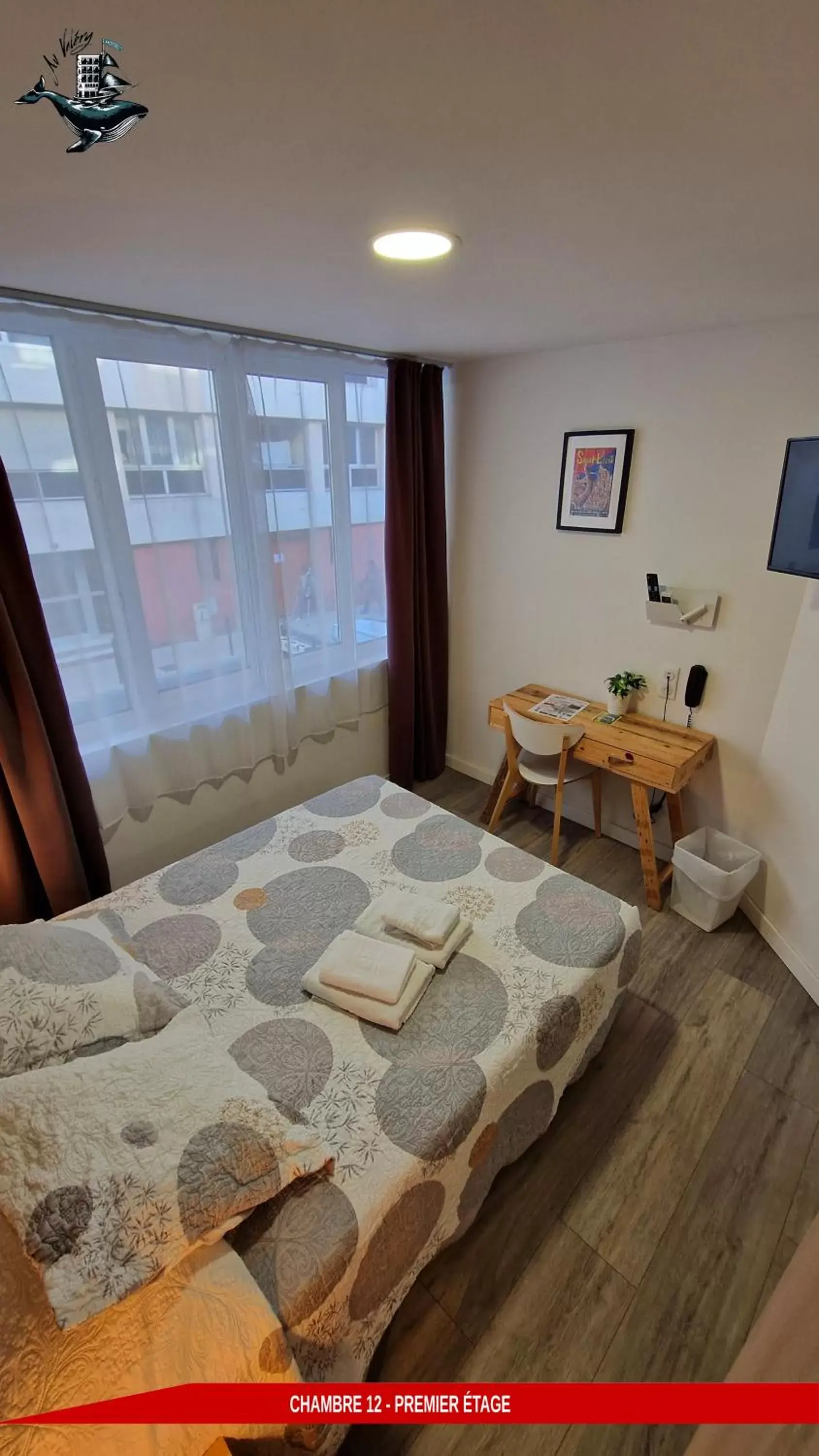 Quadruple Room in Hôtel Au Valéry Quadruple Room in Hôtel Au Valéry