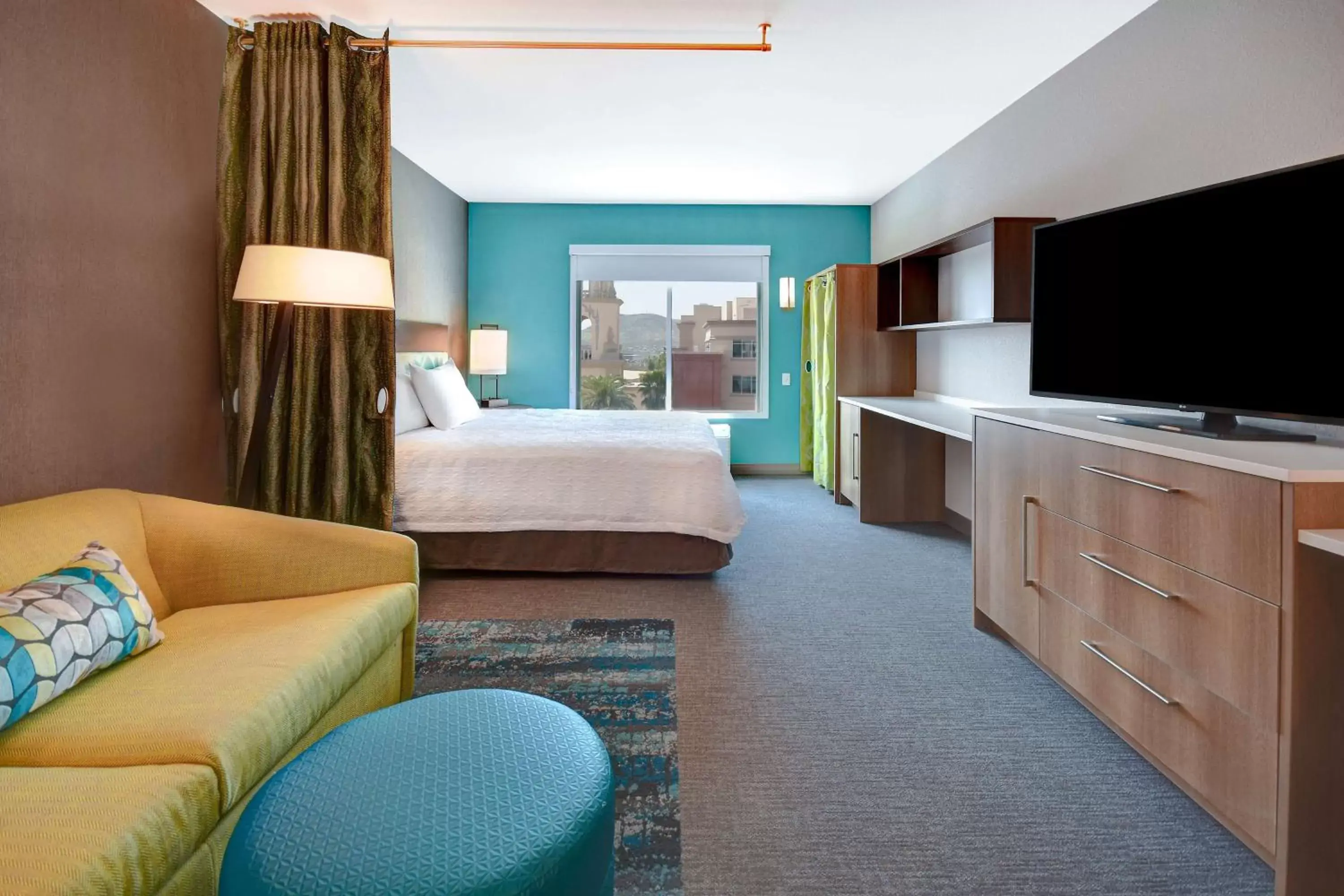 Living room, Bed in Home2 Suites By Hilton Tucson Downtown Living room, Bed in Home2 Suites By Hilton Tucson Downtown