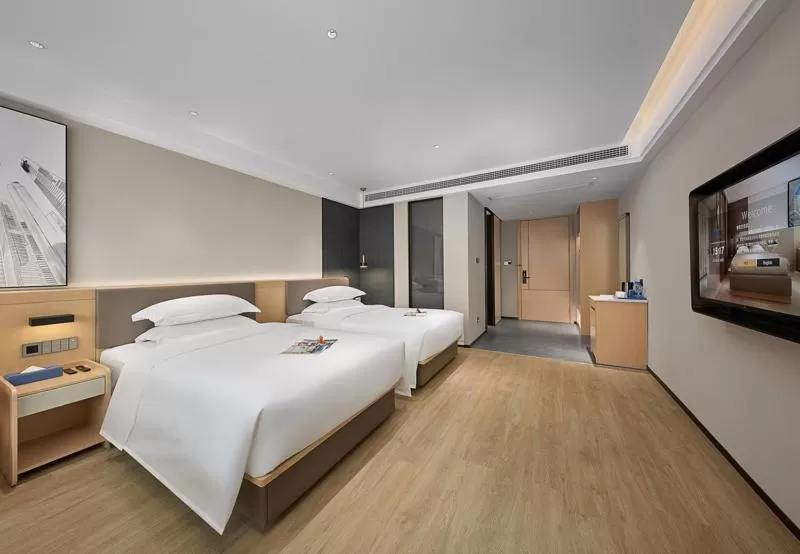 Photo of the whole room, Bed in Fengyue Light Shang Hotel Guangzhou Baiyun Airport Store