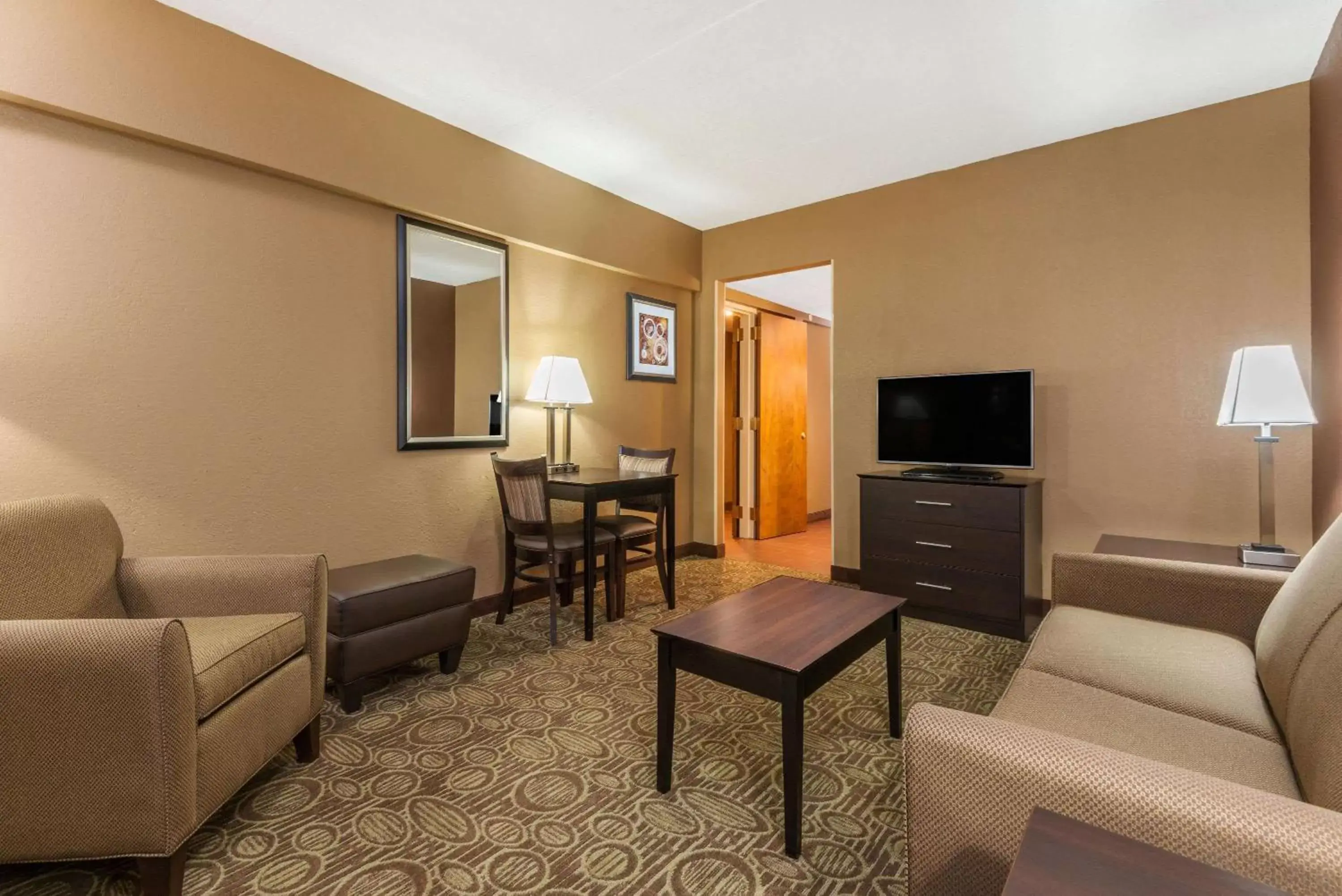 Photo of the whole room, Seating Area in Ramada by Wyndham Paintsville Hotel & Conference Center