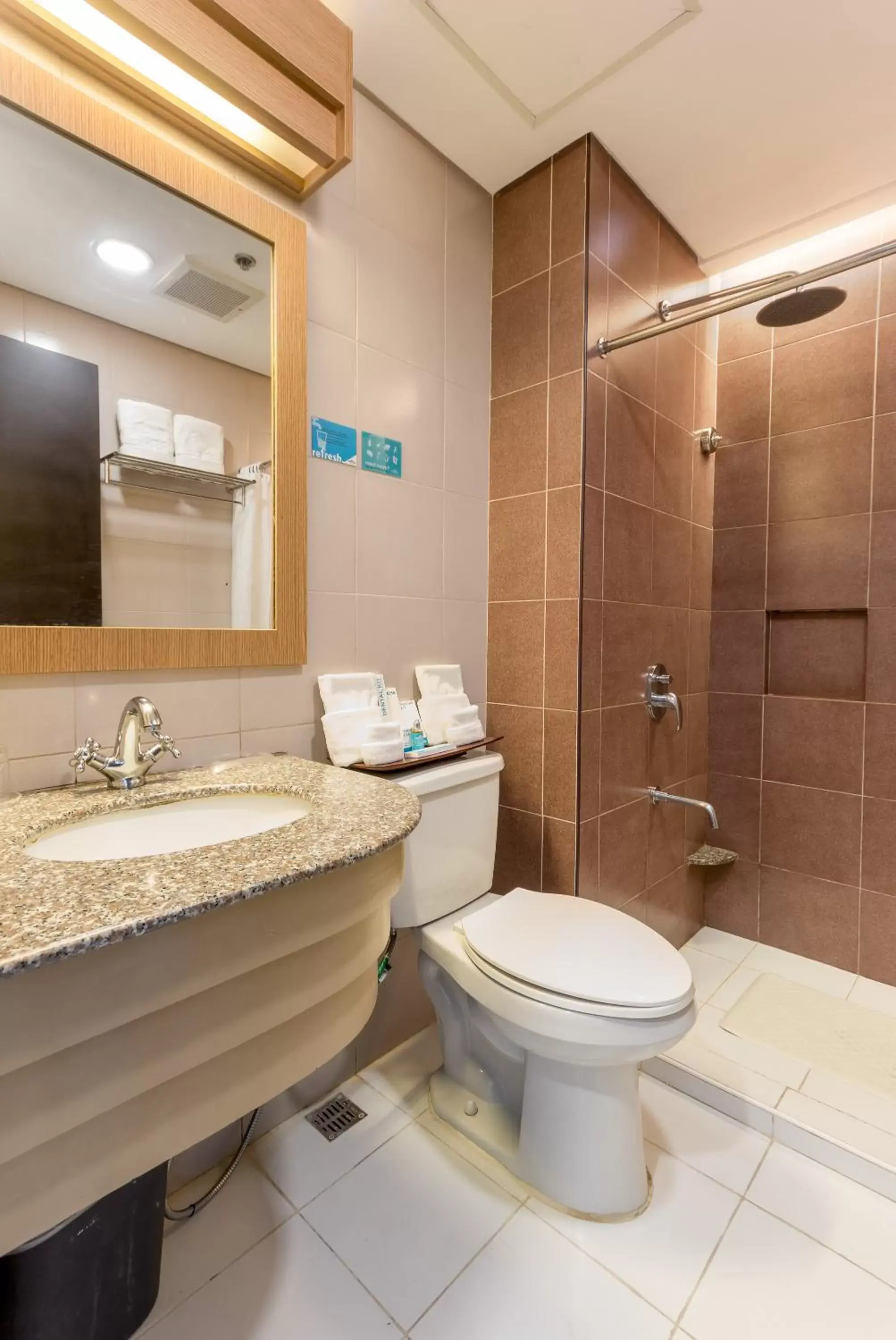 Bathroom in Microtel by Wyndham South Forbes