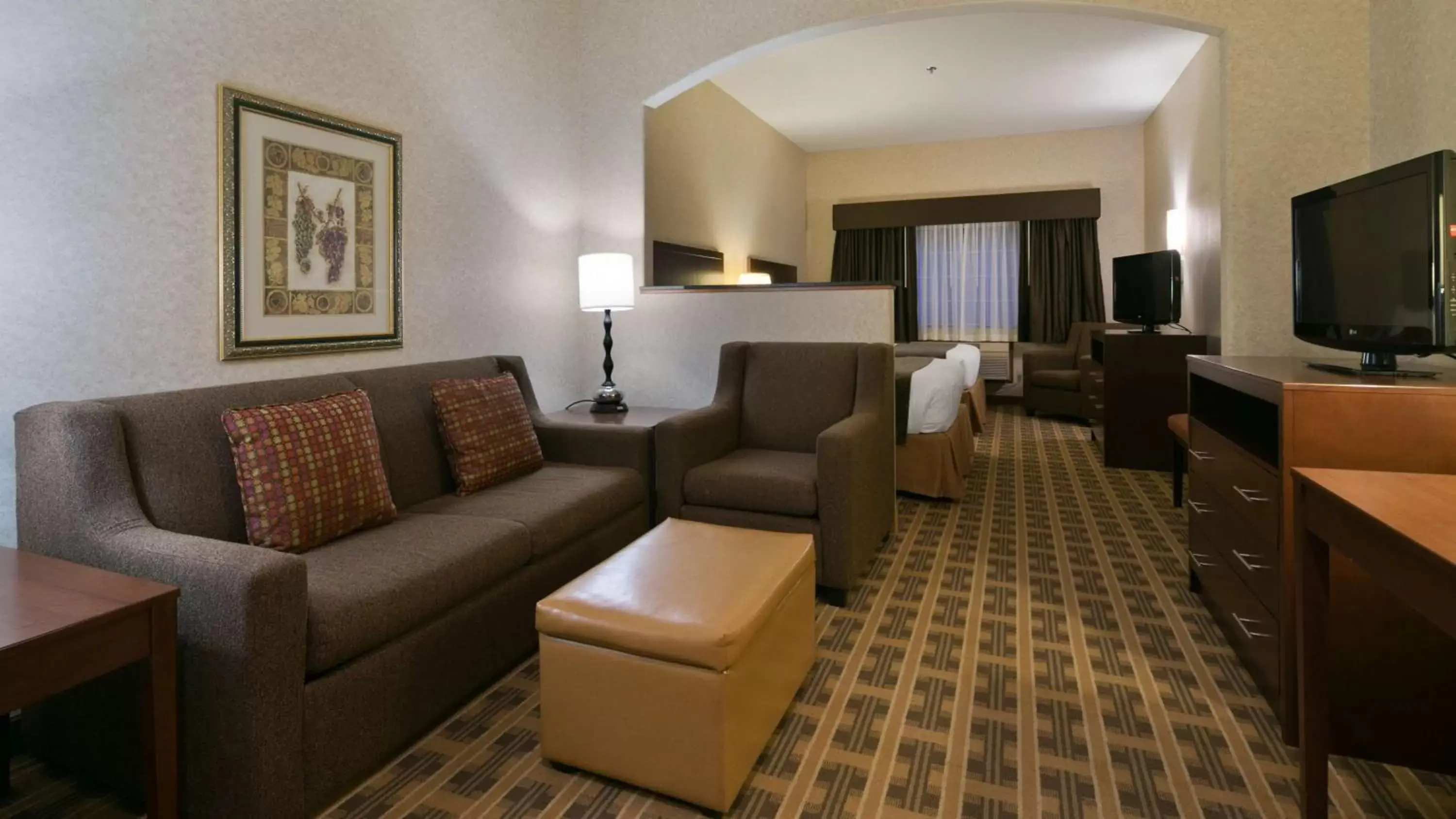 Photo of the whole room, Seating Area in Best Western University Inn and Suites