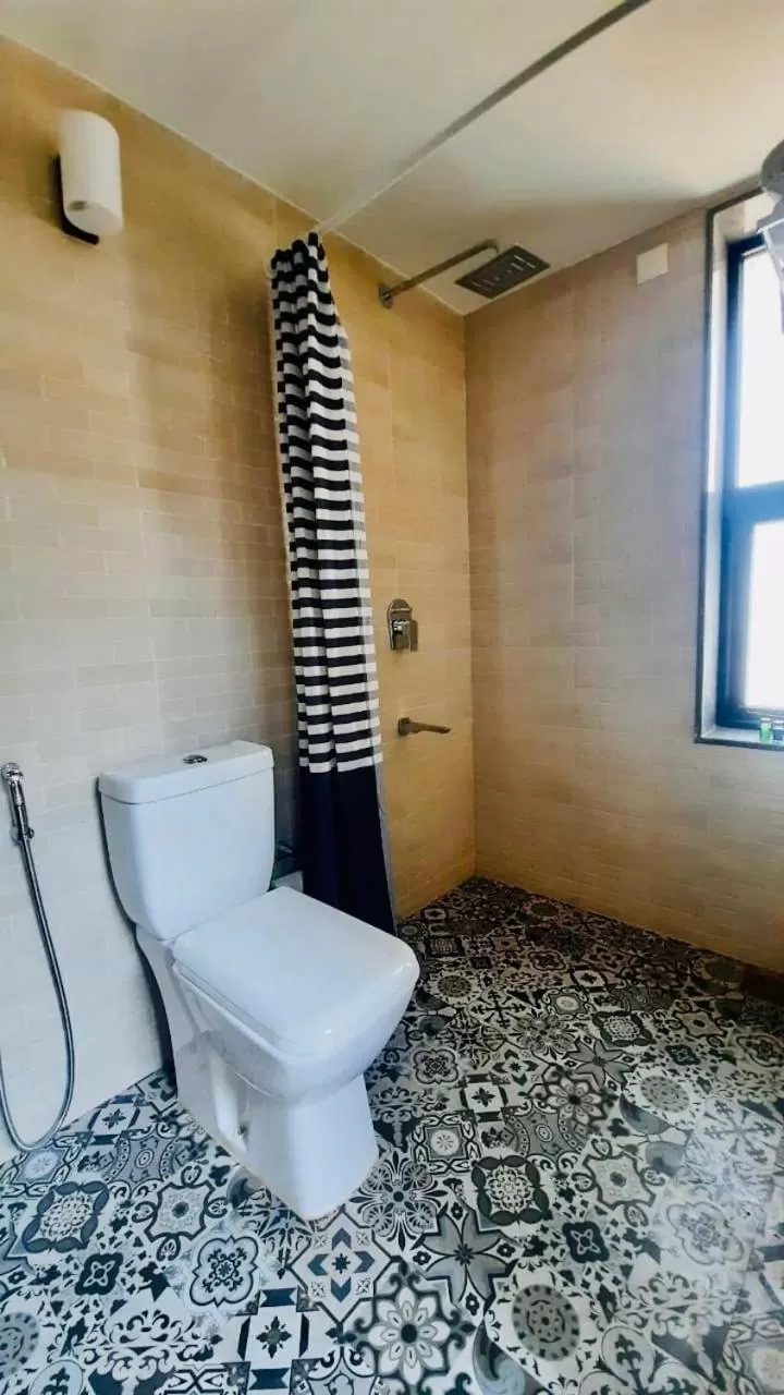 Bathroom in HALF Hotel, Calangute