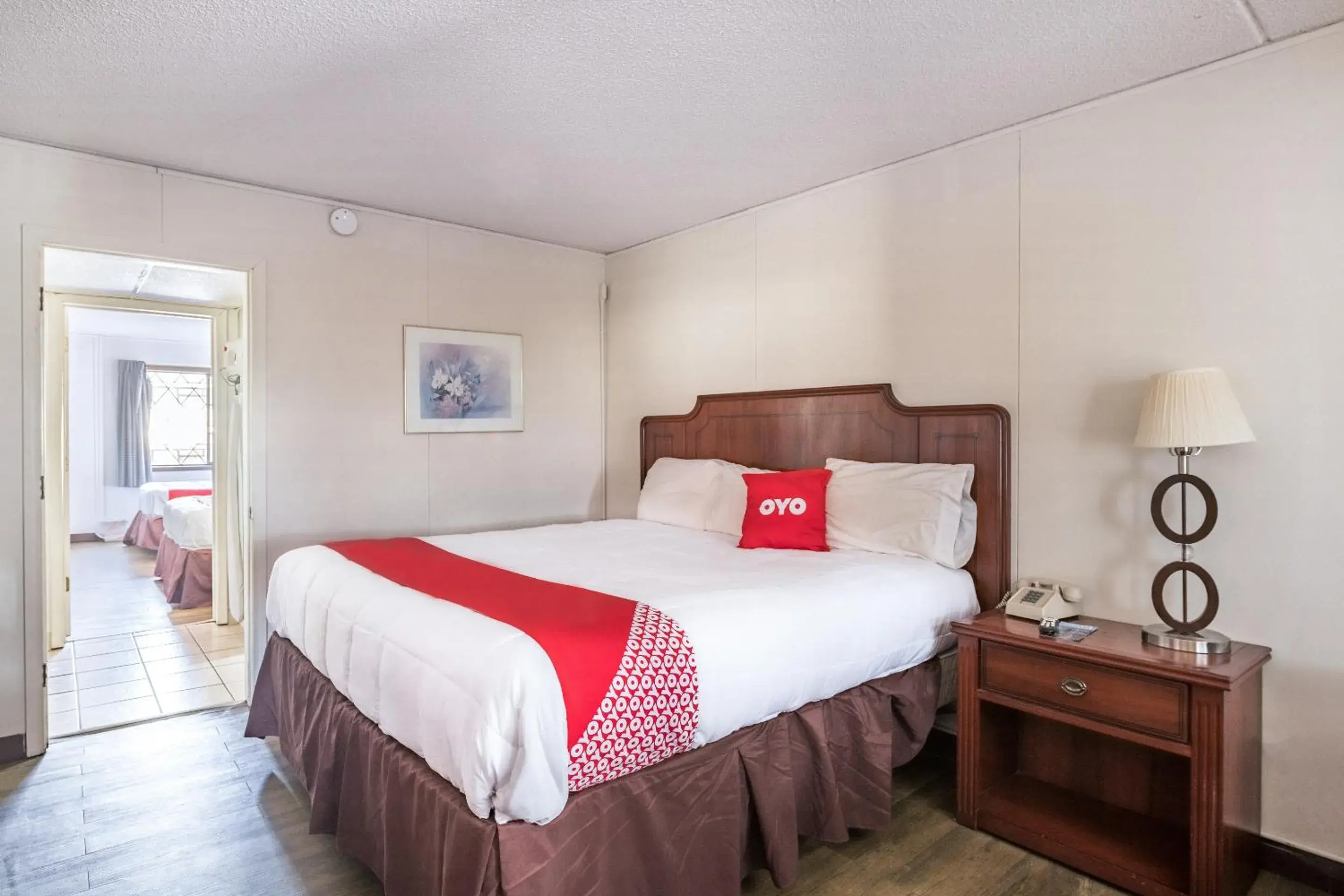 Bedroom, Bed in OYO Hotel Windmill Branson