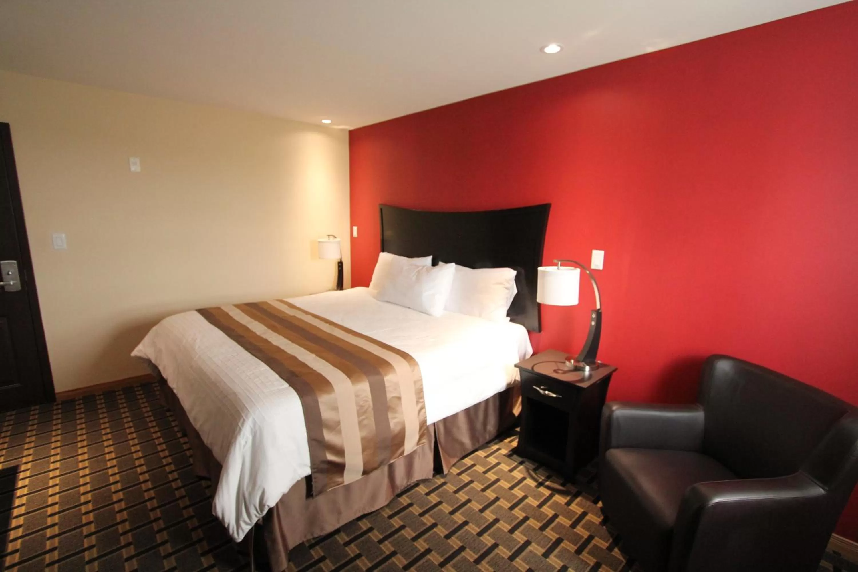 Bed in Masterson's Motel