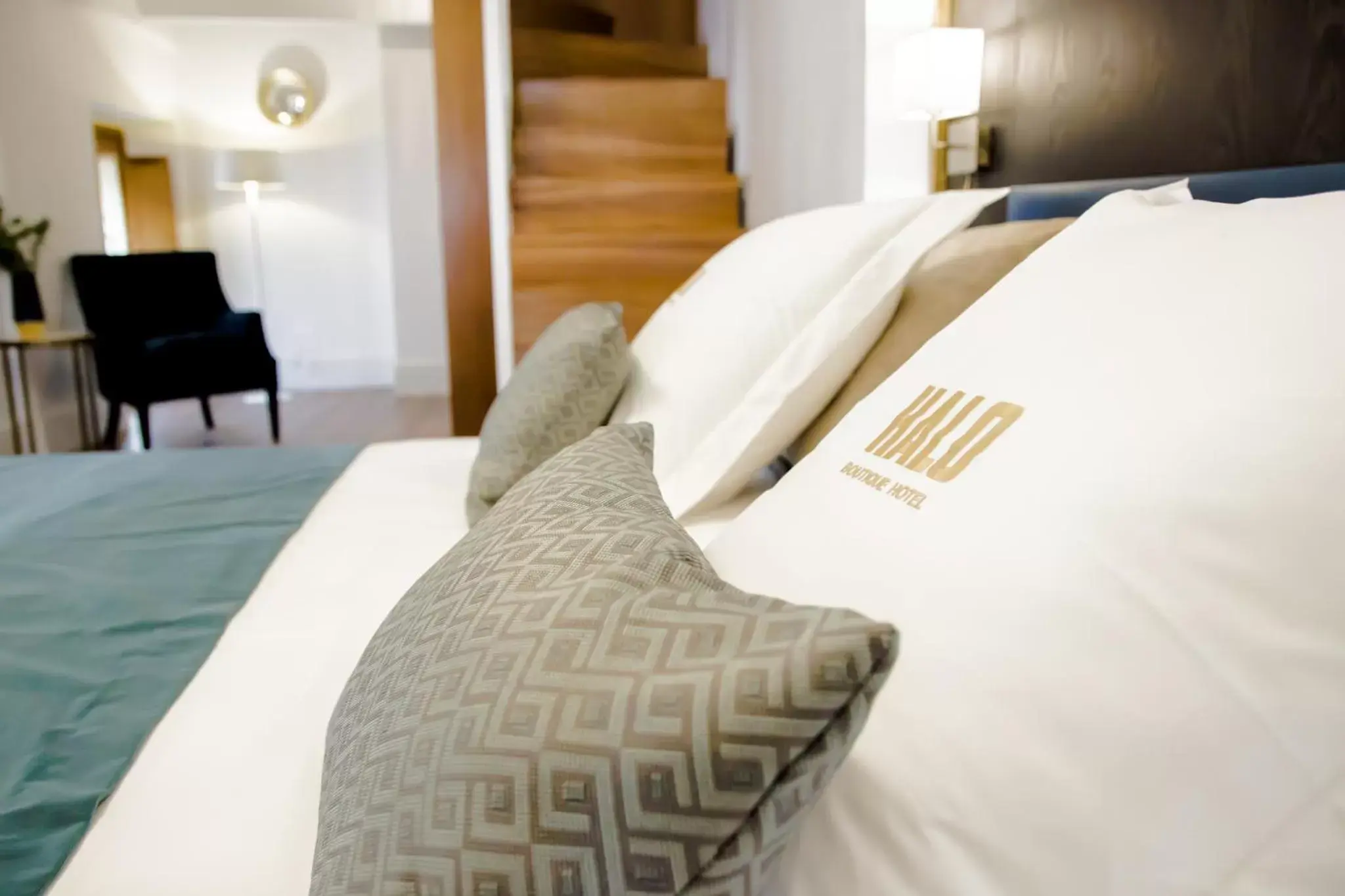 Bed in Halo Boutique Hotel