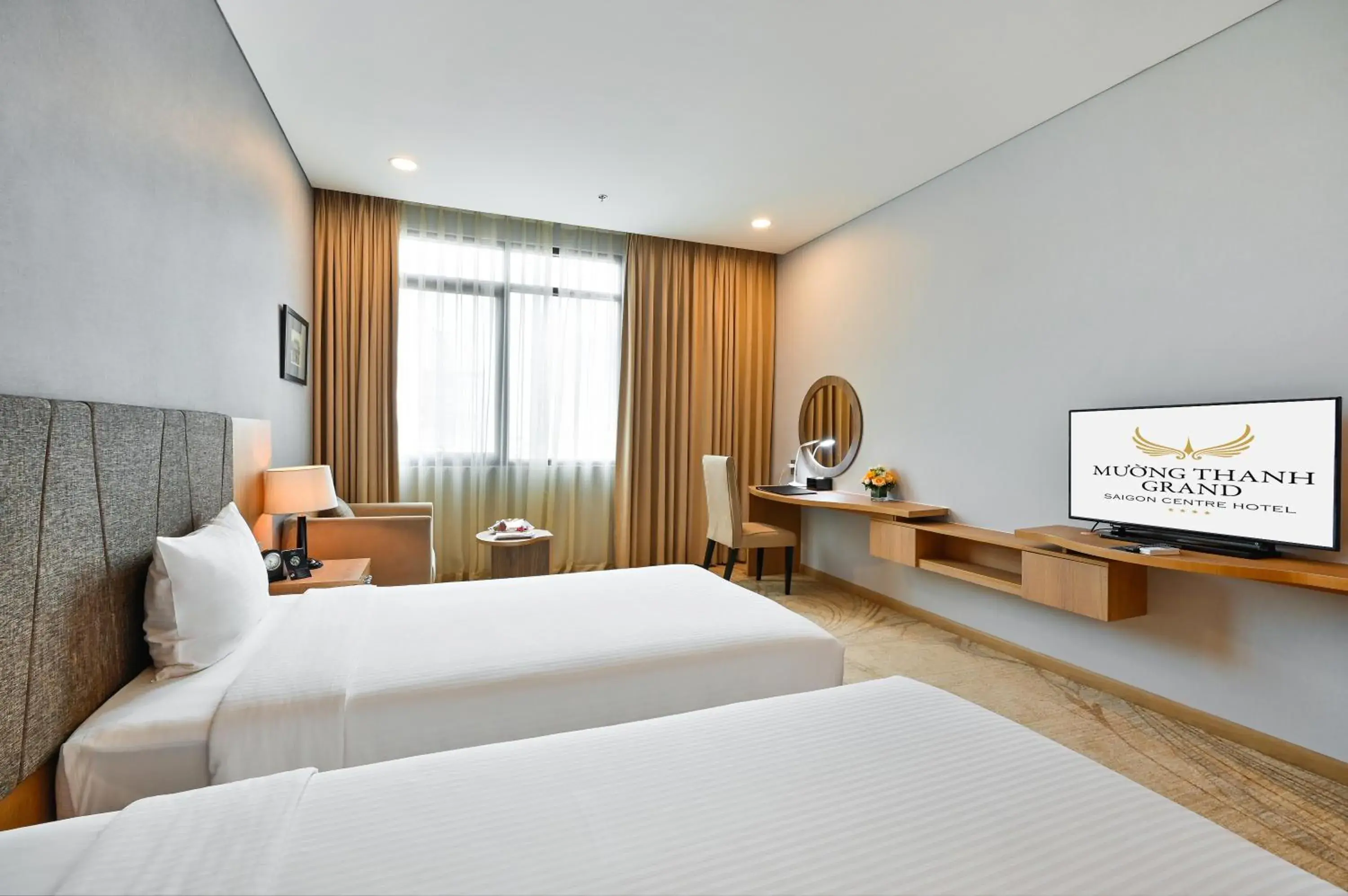 Communal lounge/ TV room, Bed in Muong Thanh Grand Saigon Centre Hotel