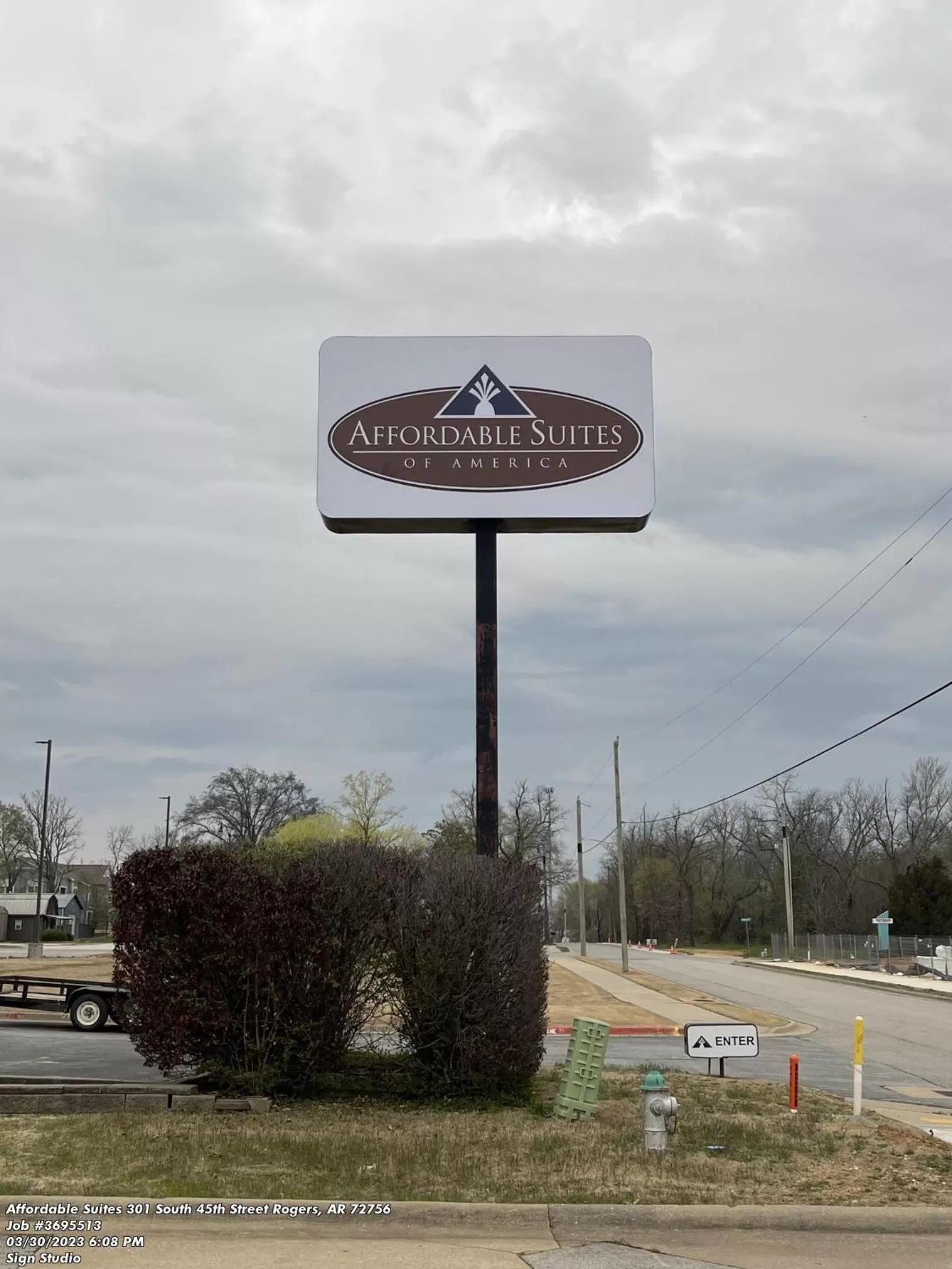 Property logo or sign in Affordable Suites of America Rogers - Bentonville
