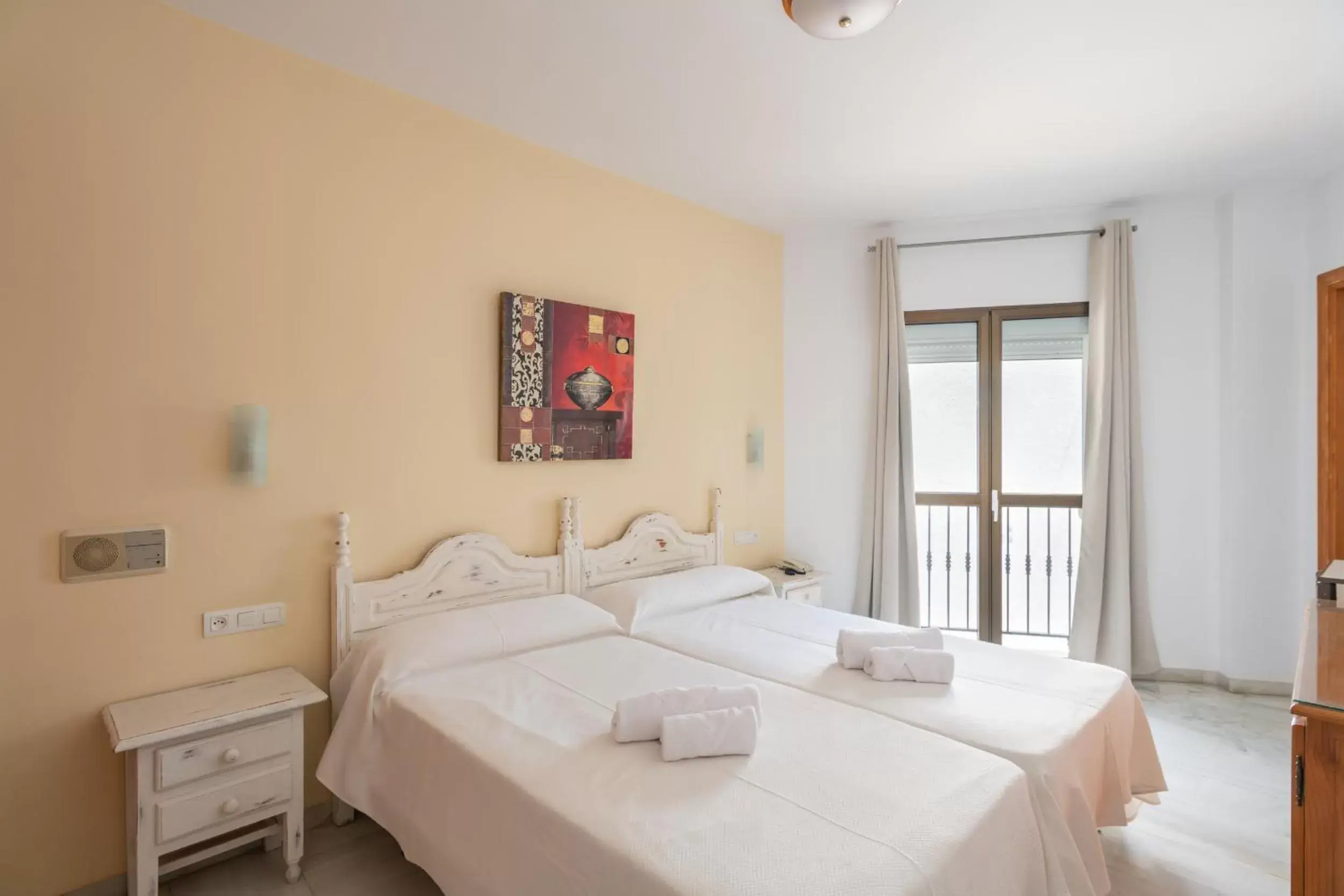 Bed in Apartahotel Playamaro by Dorobe Bed in Apartahotel Playamaro by Dorobe