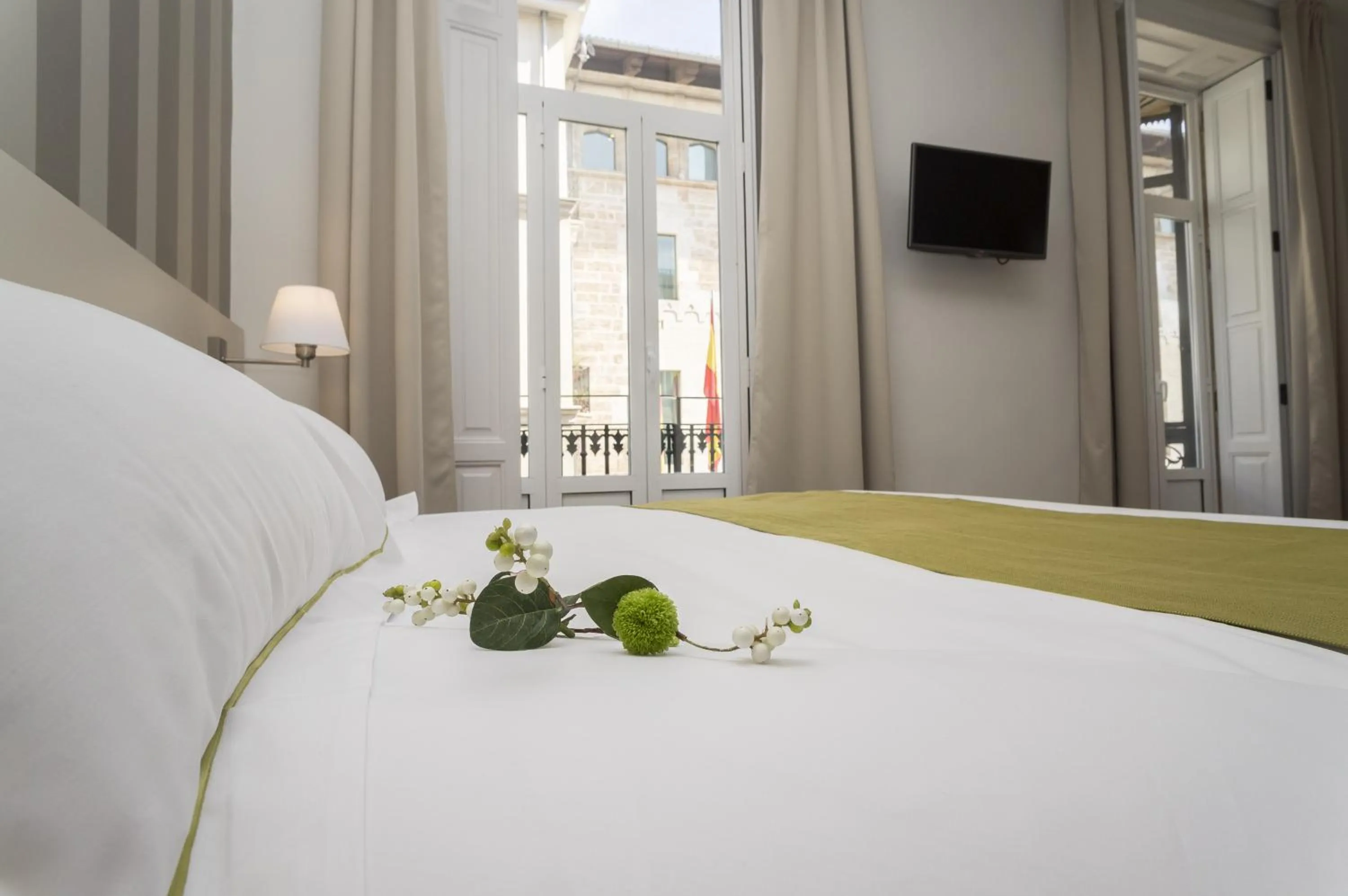 Bed in Hotel San Lorenzo Boutique Plaza