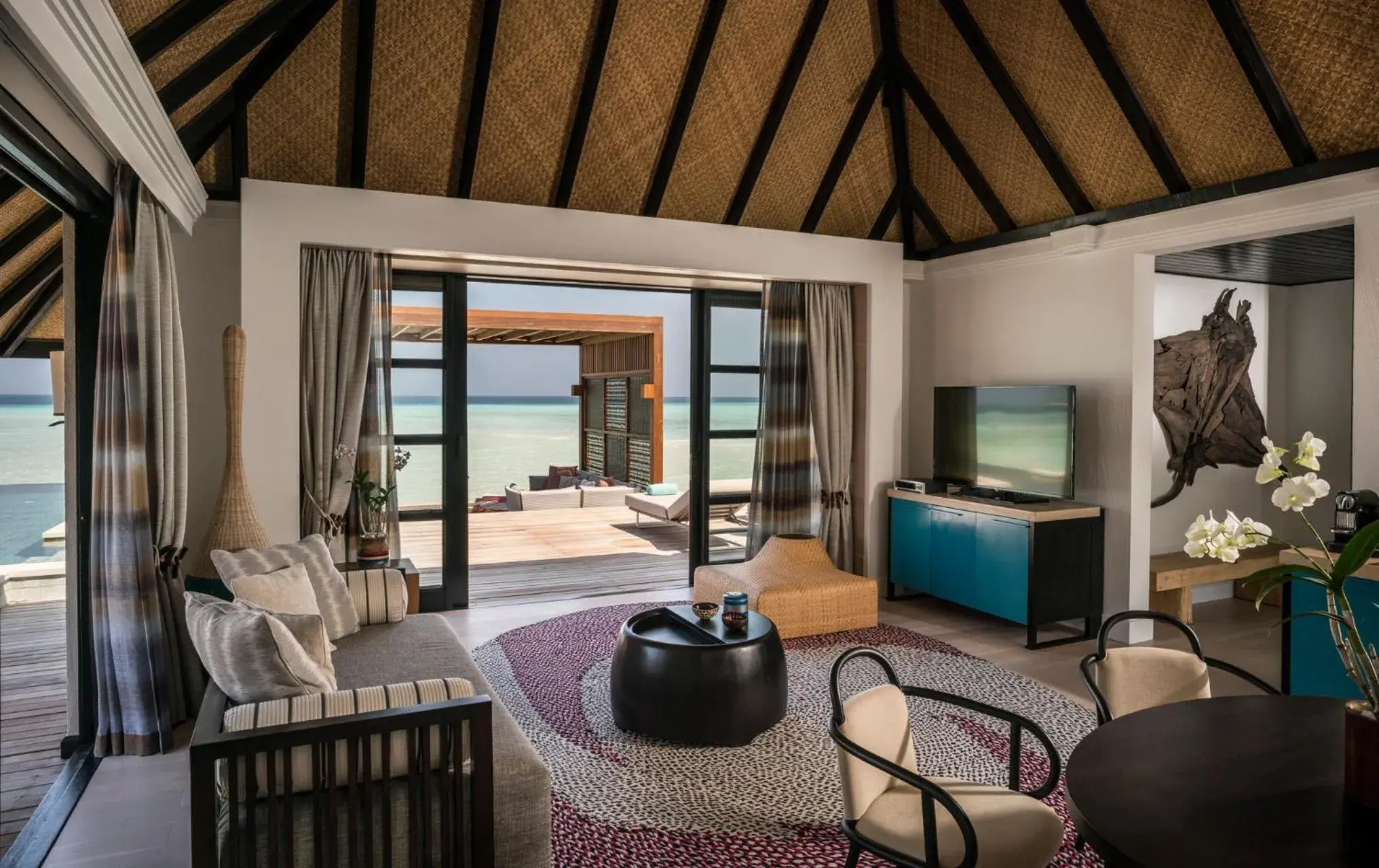 Living room, Seating Area in Four Seasons Resort Maldives at Kuda Huraa