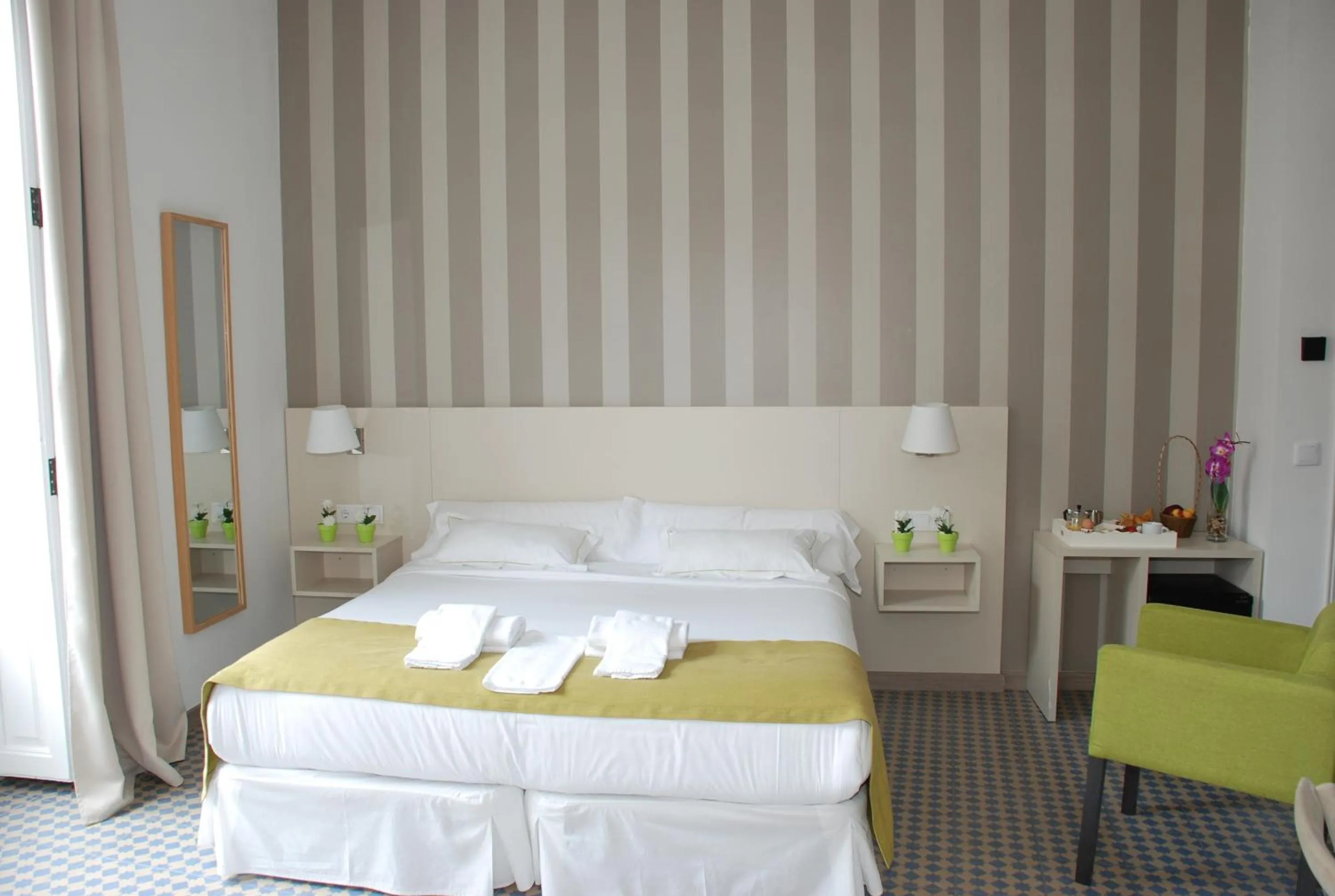 Bed in Hotel San Lorenzo Boutique Plaza