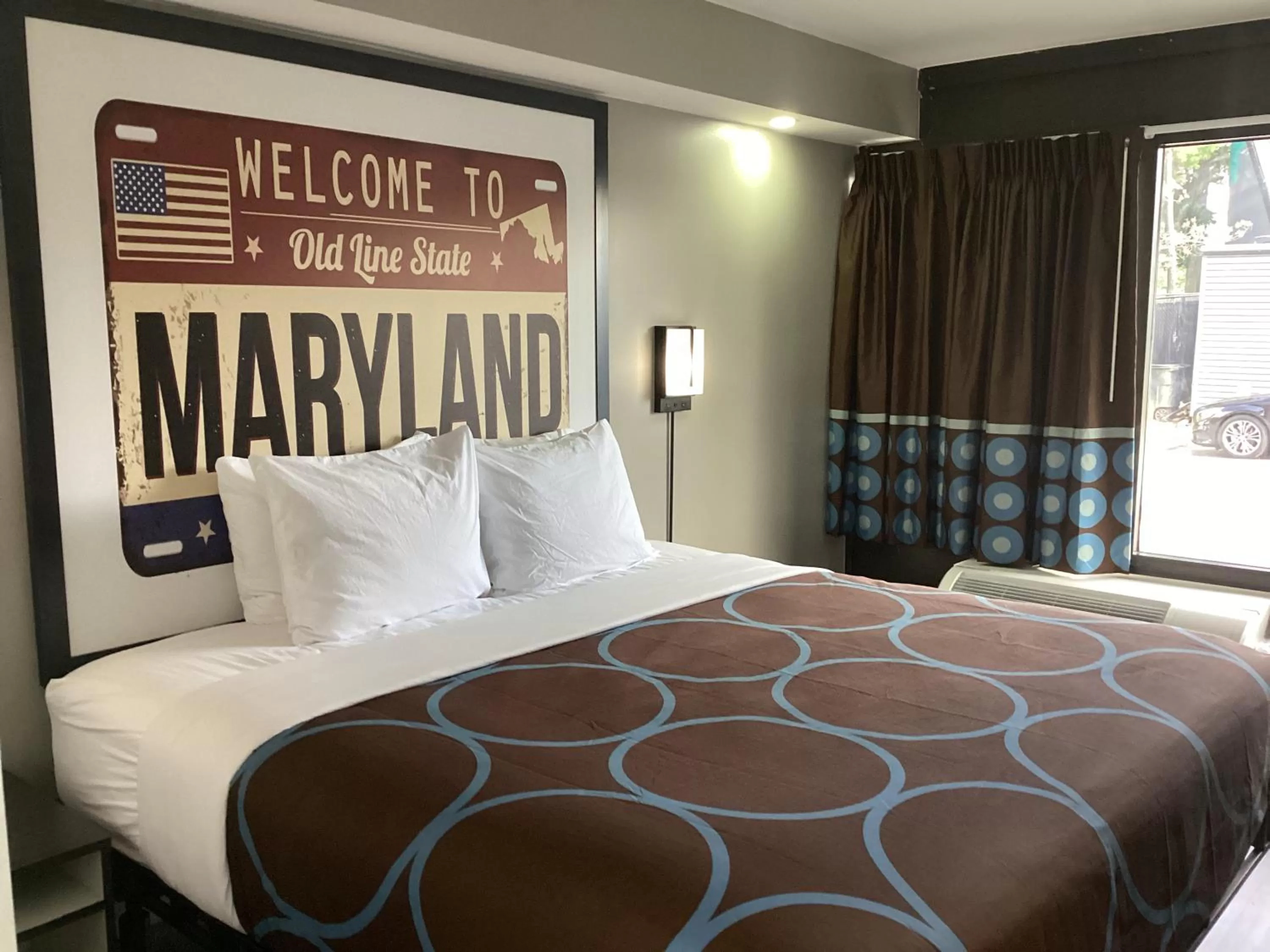 Bed in Super 8 by Wyndham Baltimore Northwest