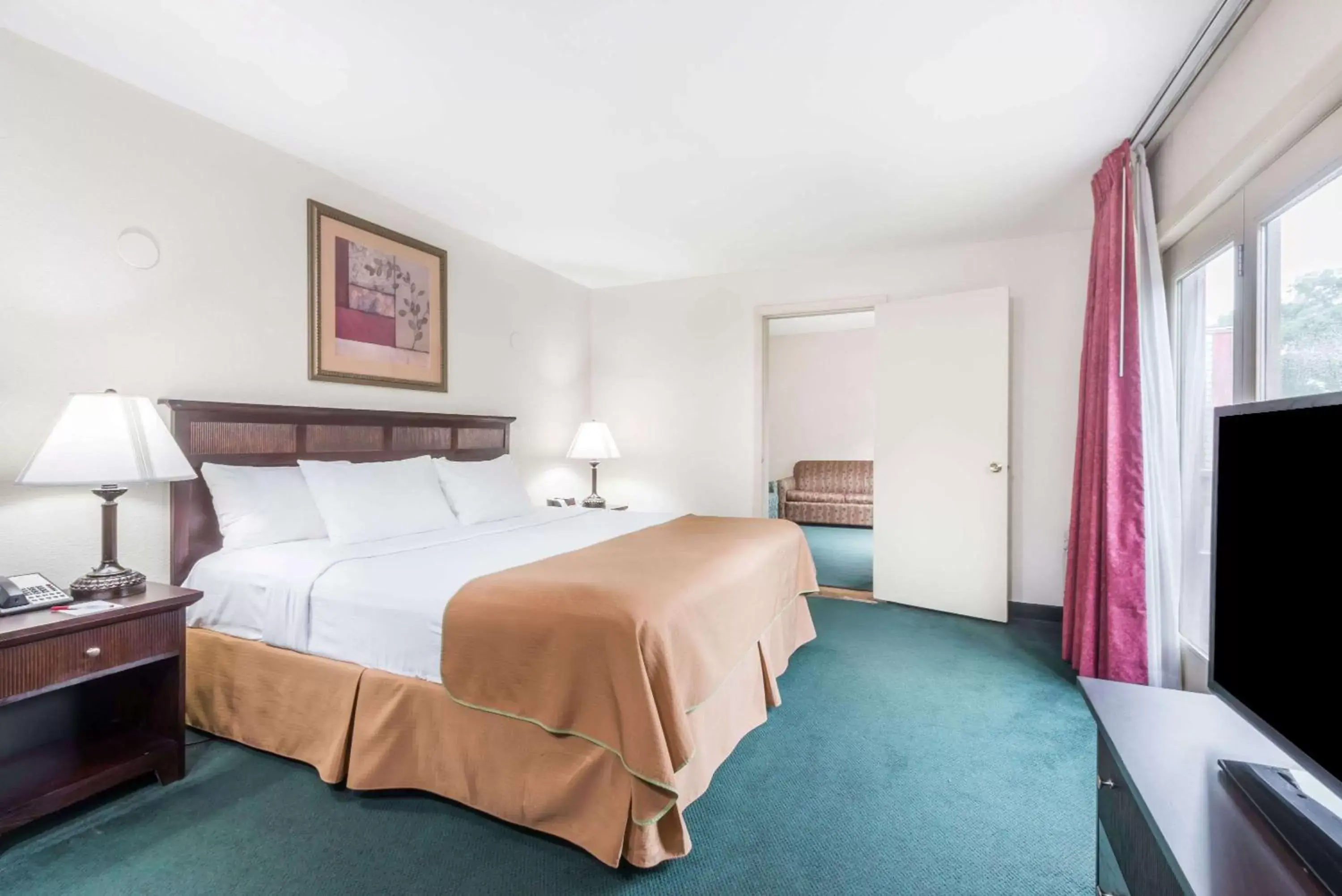 Photo of the whole room, Bed in Ramada by Wyndham Groton