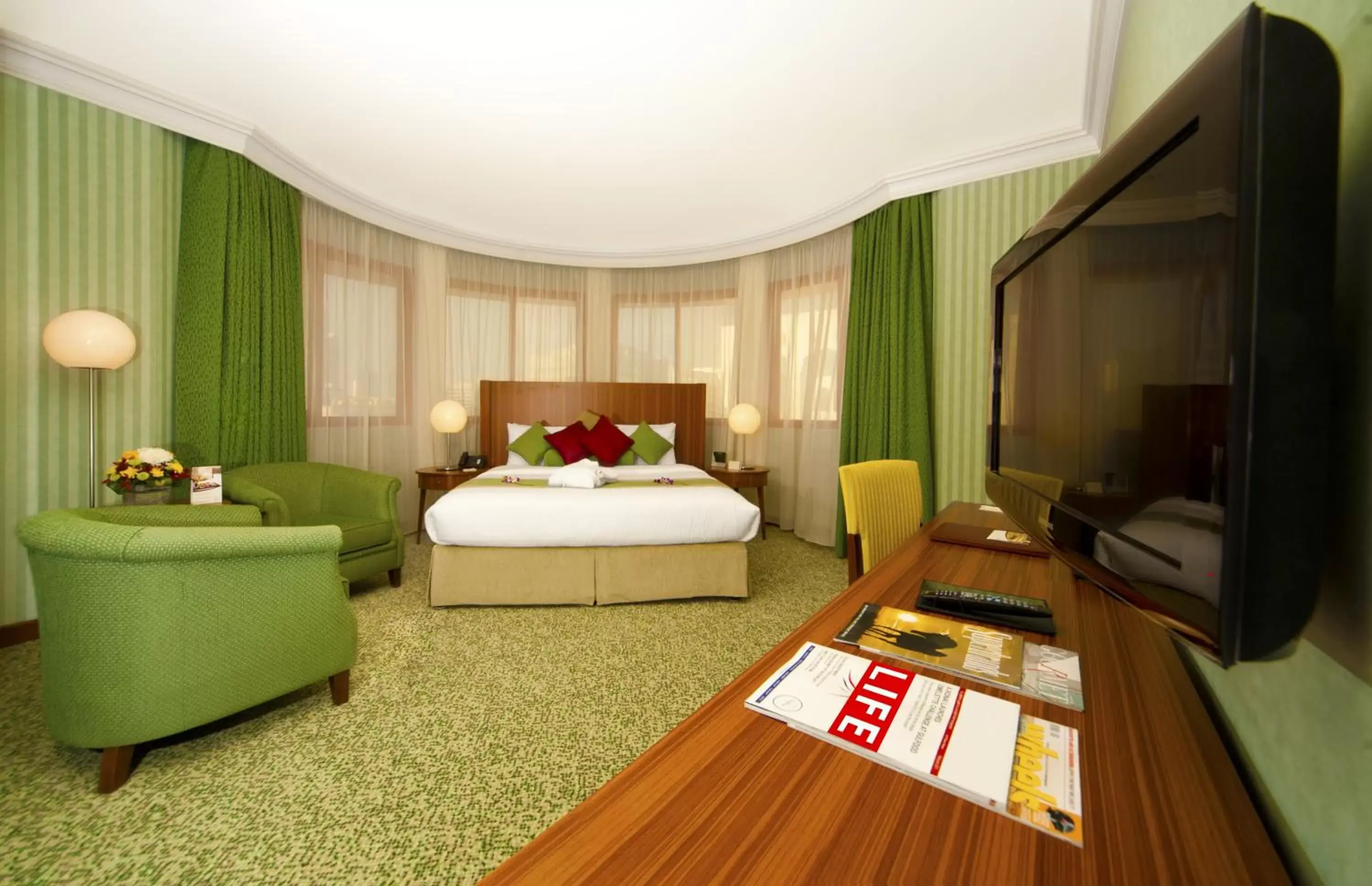 Bedroom, Seating Area in City Seasons Al Hamra Hotel