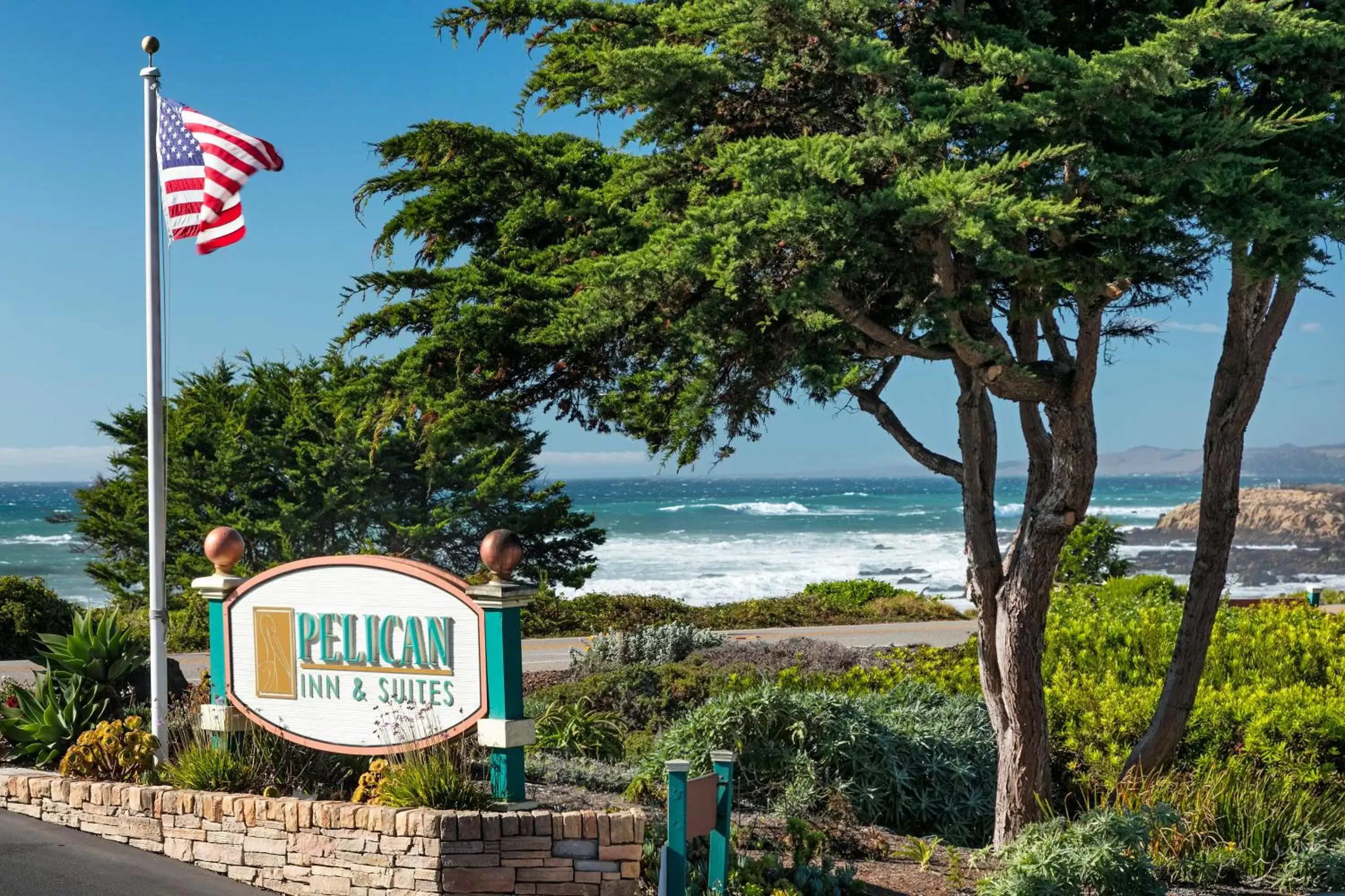 Sea view, Property Logo/Sign in Pelican Inn & Suites