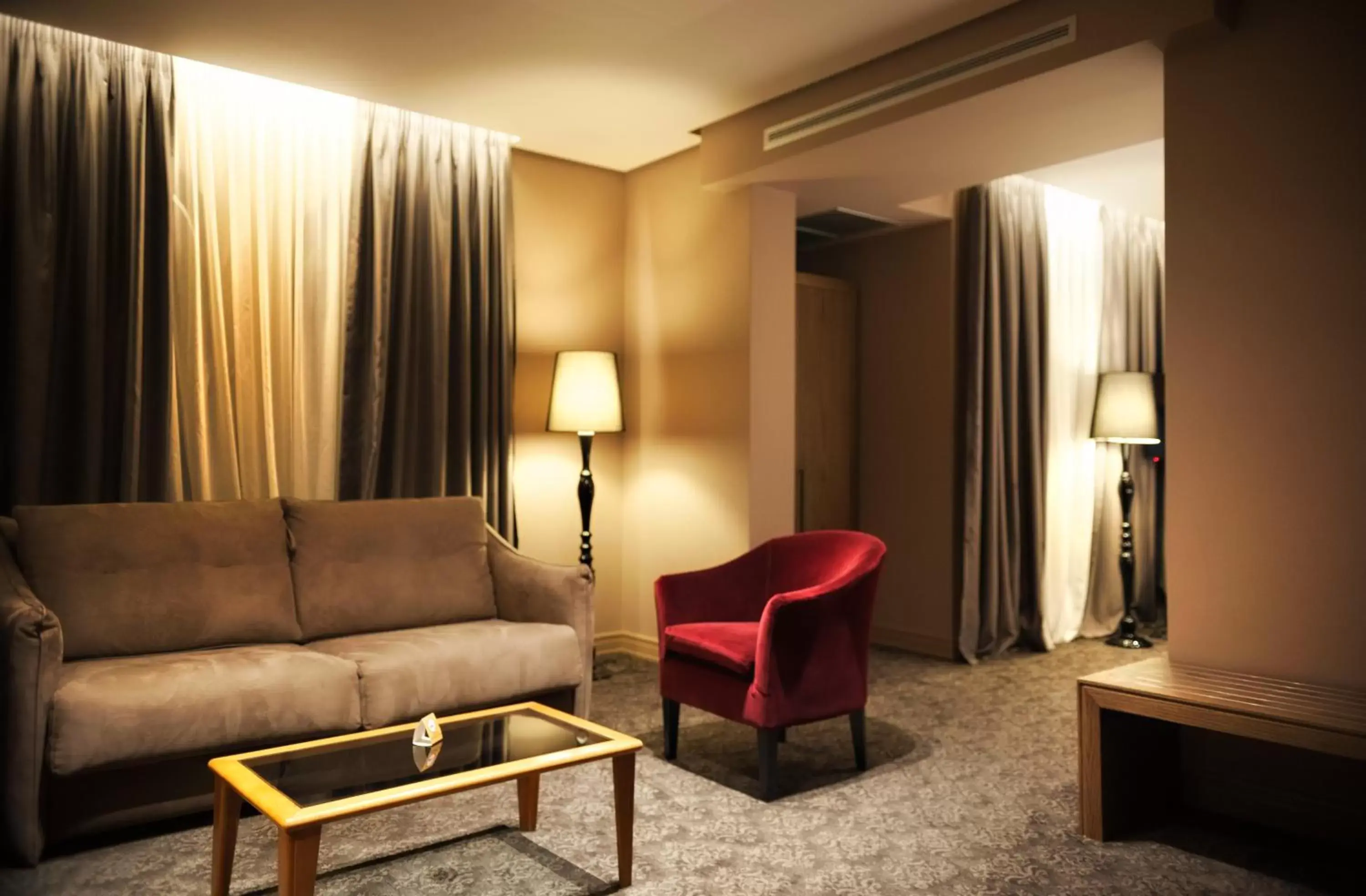 Living room in Mondial Hotel Living room in Mondial Hotel