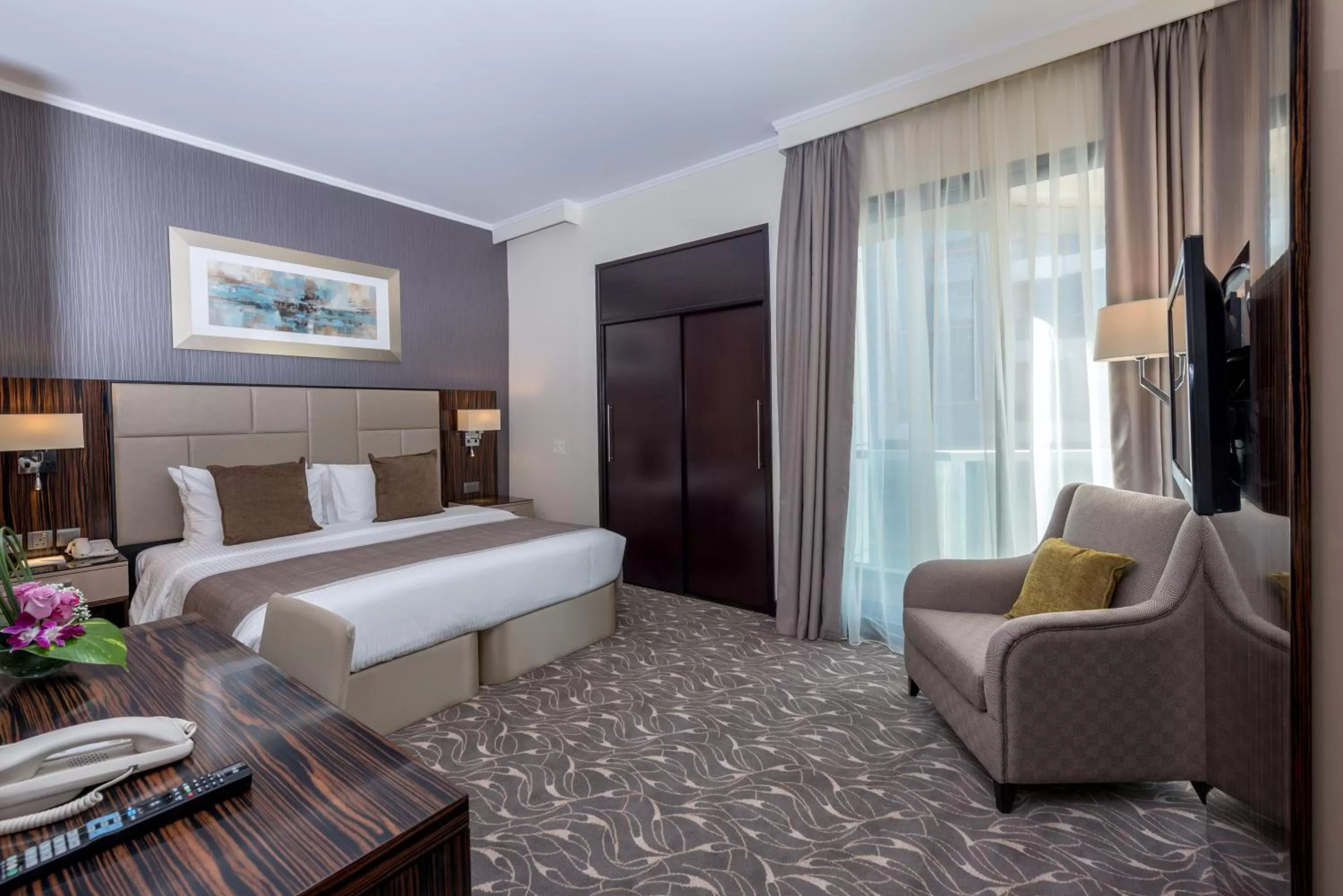 One Bedroom King Suite with City View in Hawthorn Suites by Wyndham Abu Dhabi City Center