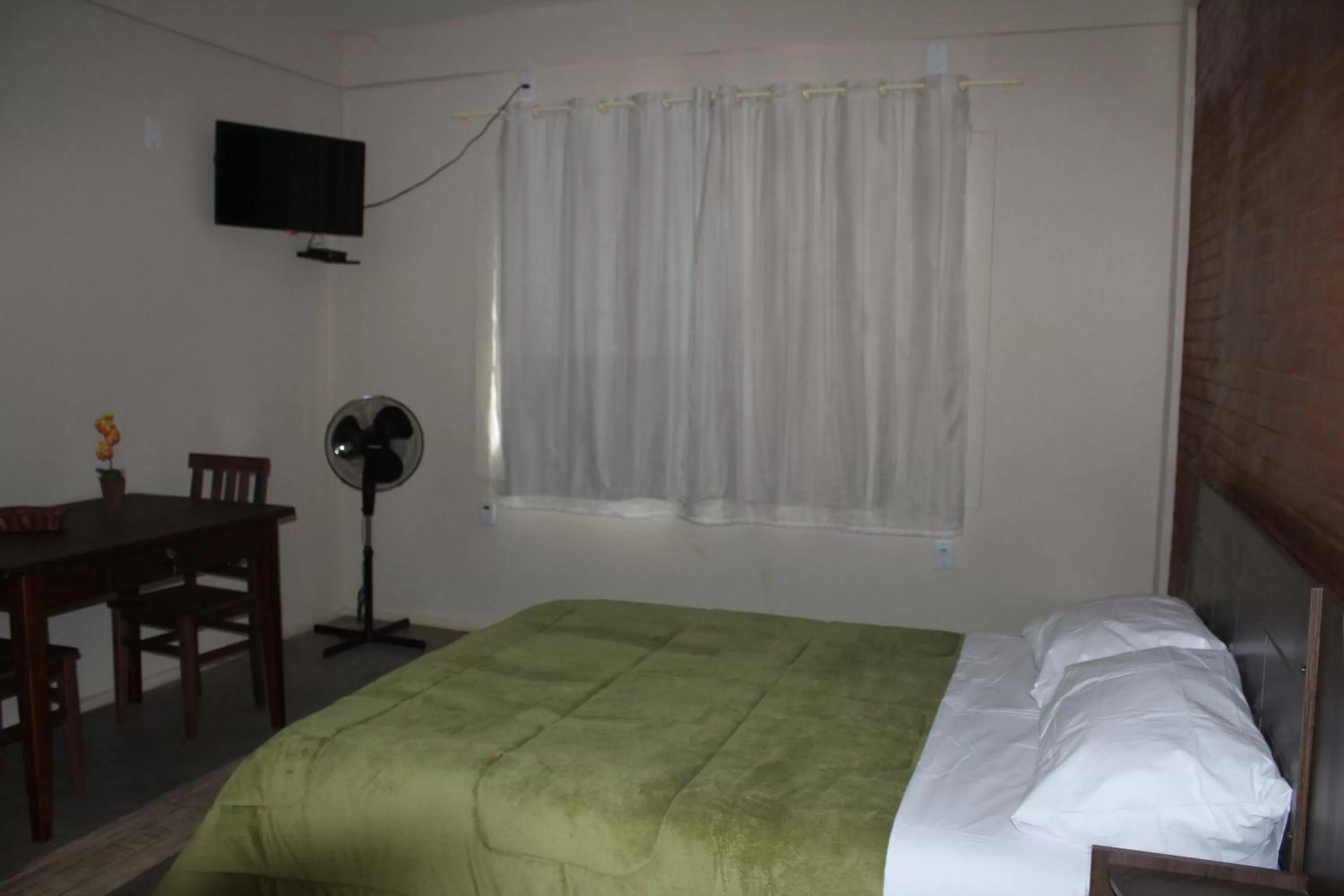 Bed in Pousada Morro dos Ventos