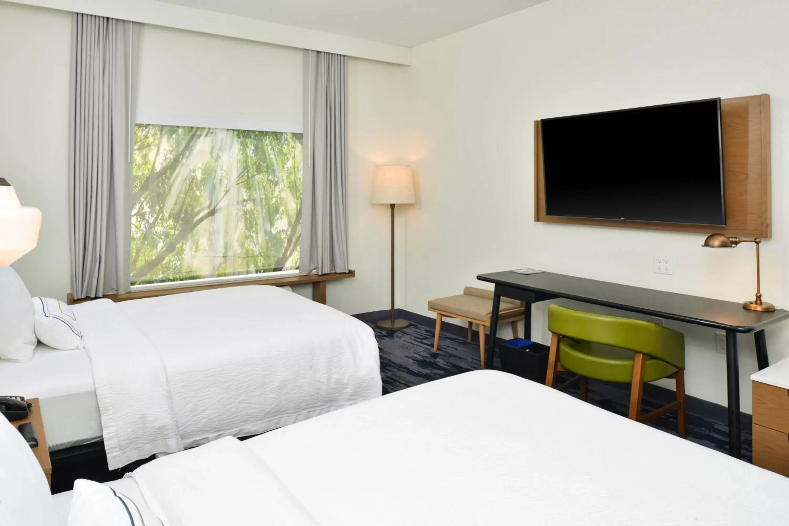 Photo of the whole room, Bed in Fairfield Inn & Suites by Marriott Charlotte University Research Park