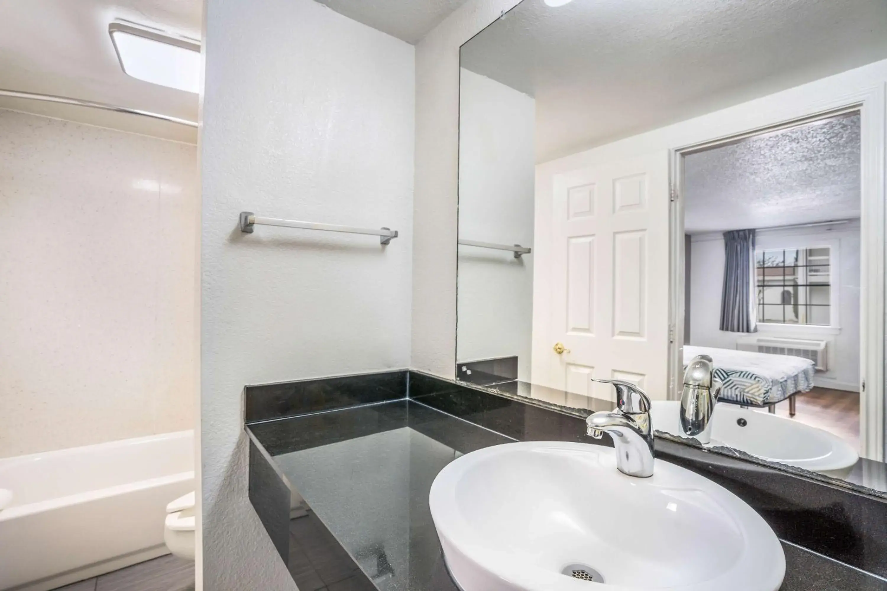 Photo of the whole room, Bathroom in Motel 6-Dallas, TX - Market Center