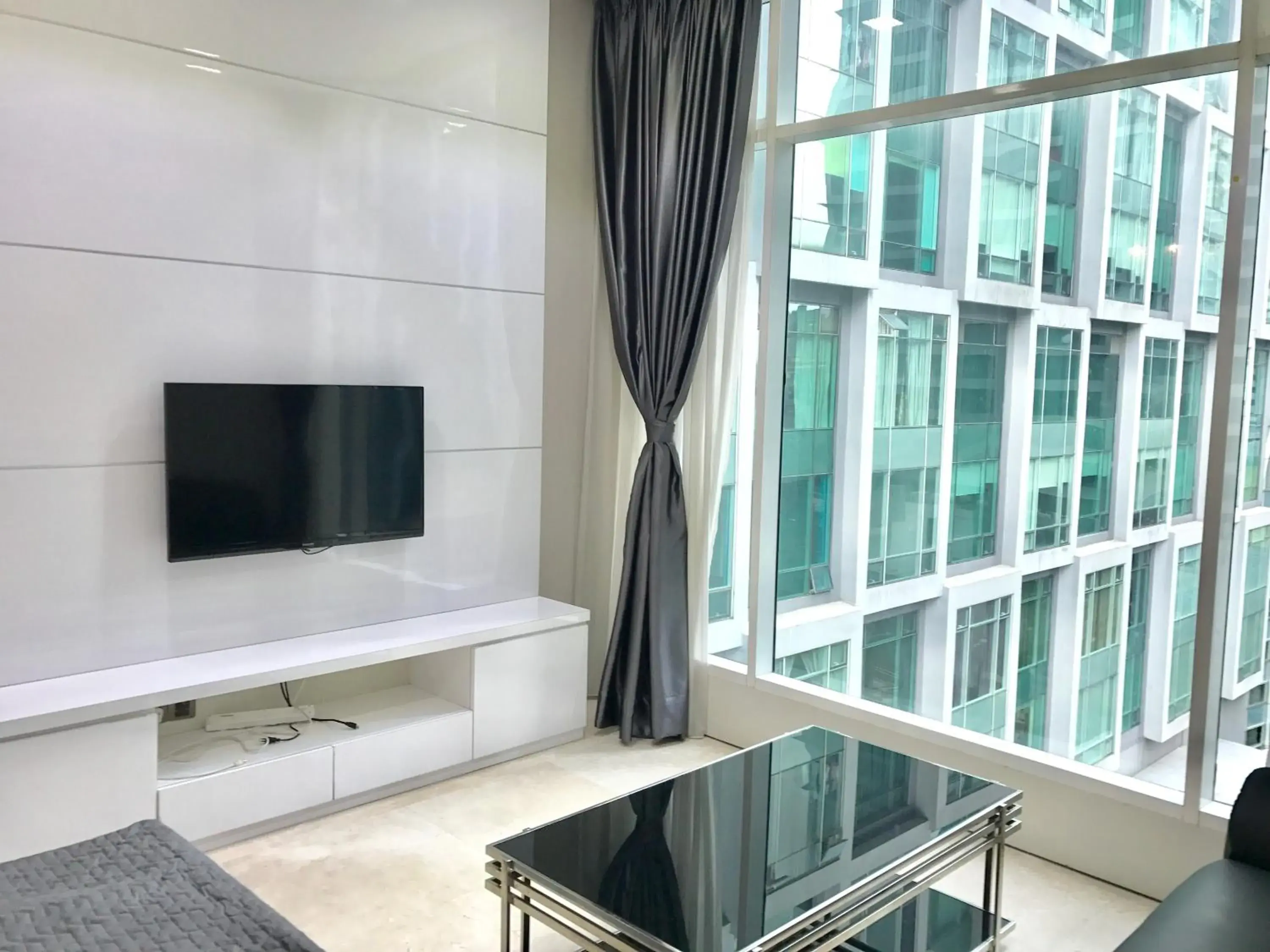 TV/Entertainment Center in Soho Suites KLCC by the Betty Roux
