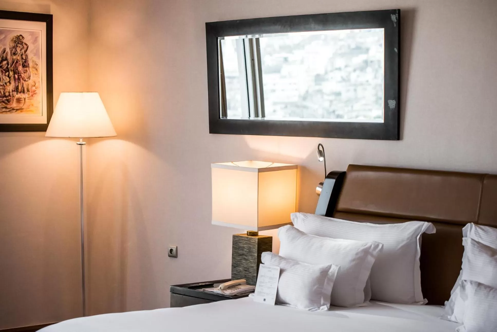 Bed in Kenzi Tower Hotel