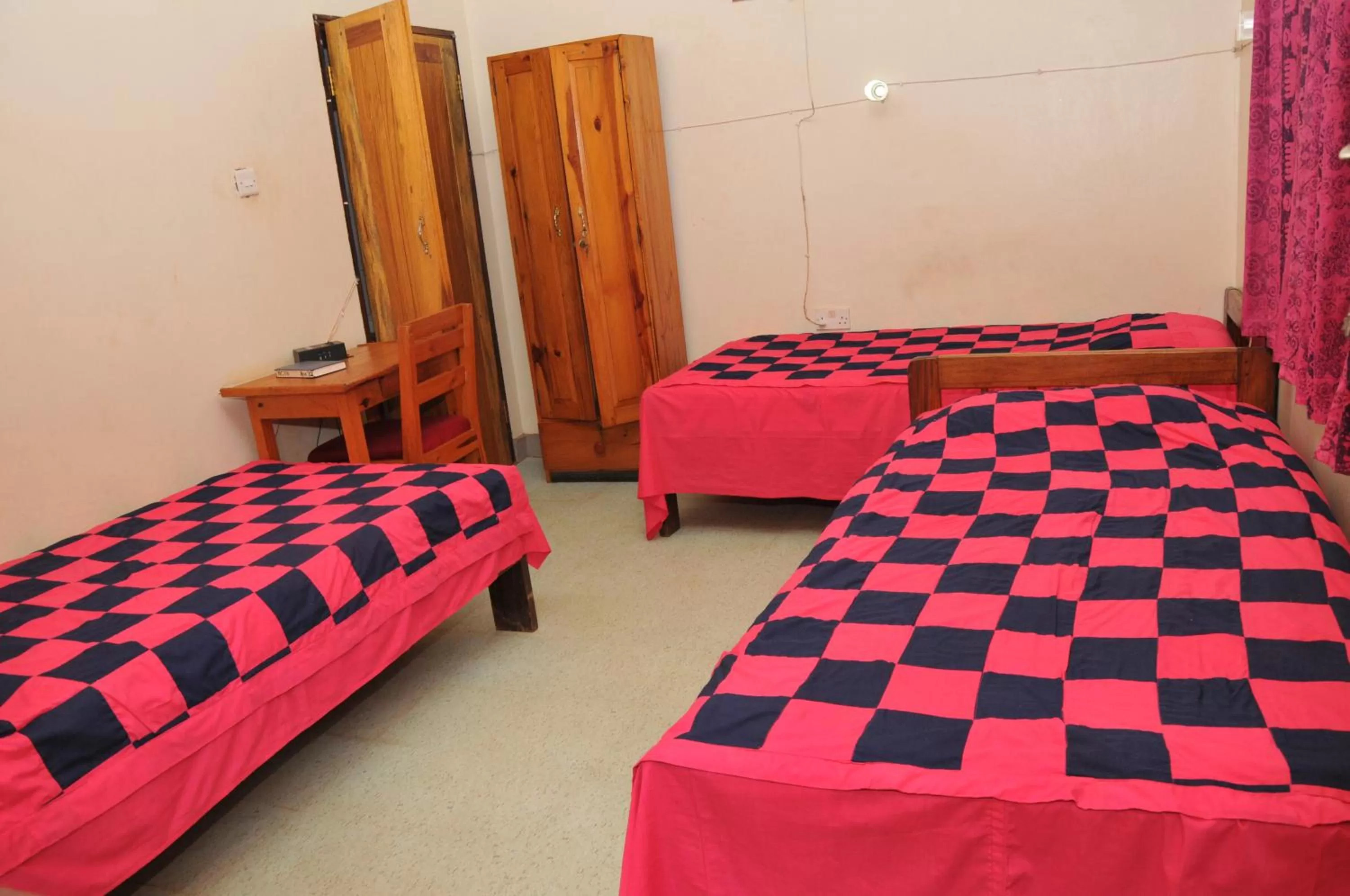 Bed in New Court View Hotel