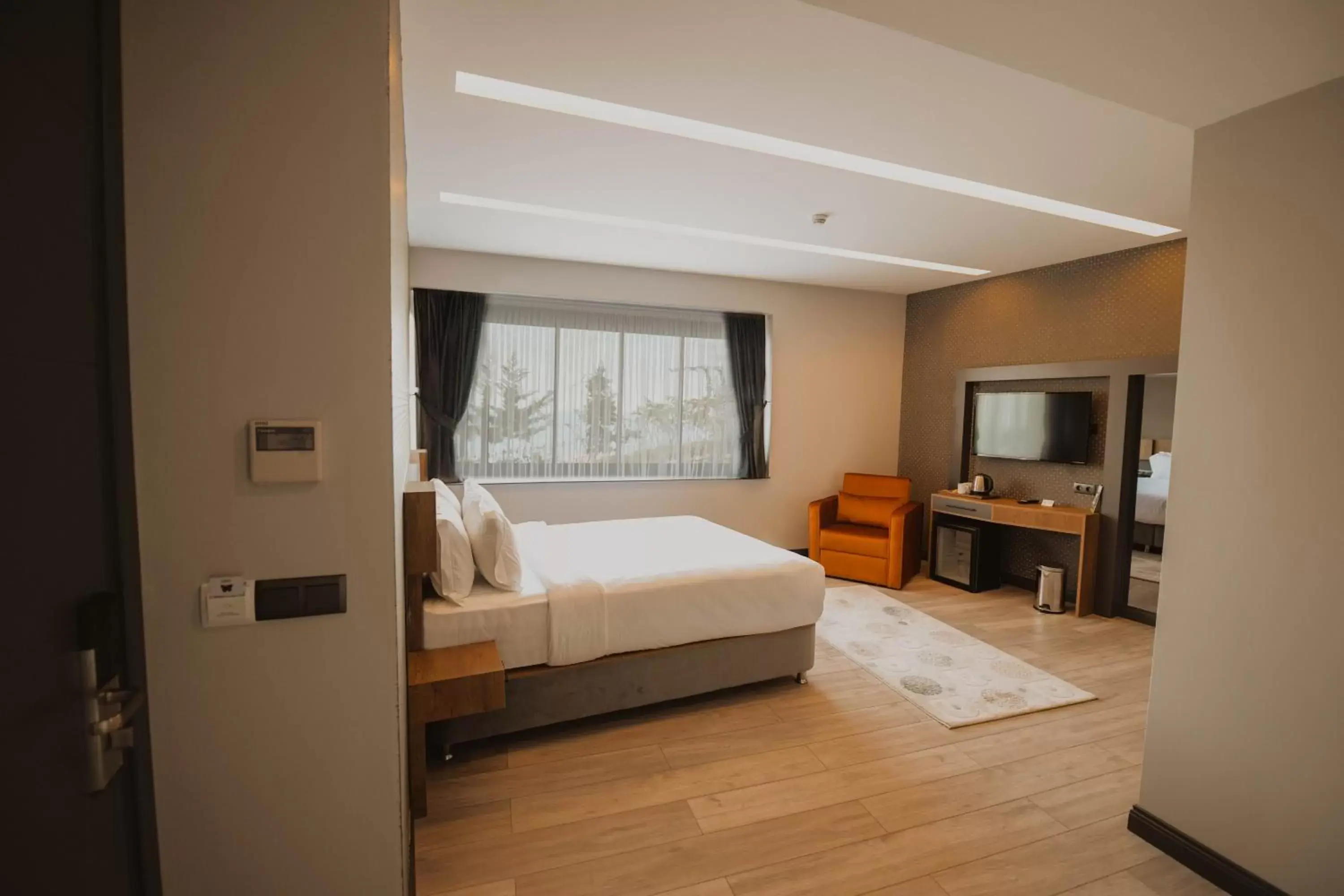 Bed in Peerless Villas Hotel Bed in Peerless Villas Hotel