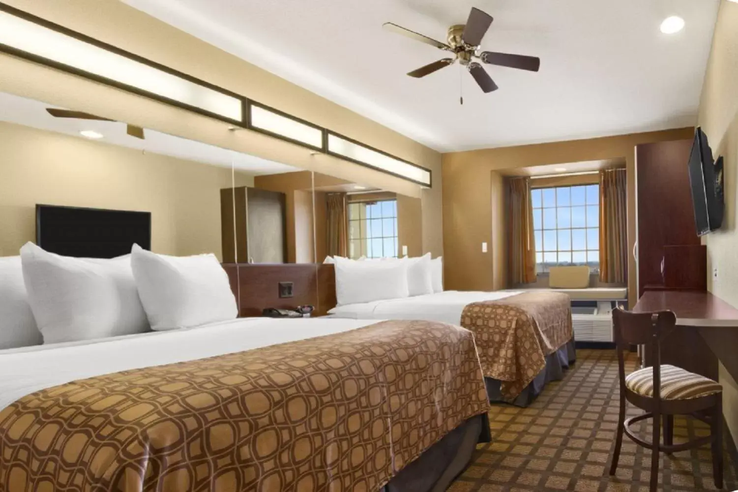 Bed in Microtel Inn & Suites by Wyndham Buda Austin South