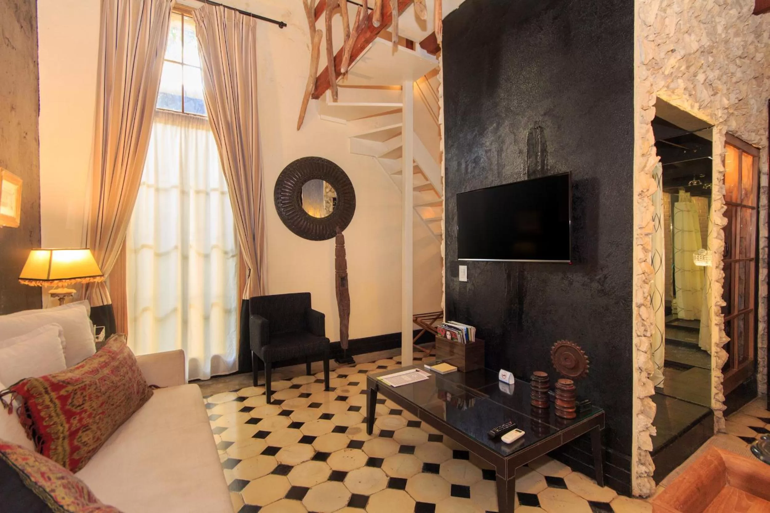 Communal lounge/ TV room in Hotel Casa Lola Deluxe Gallery