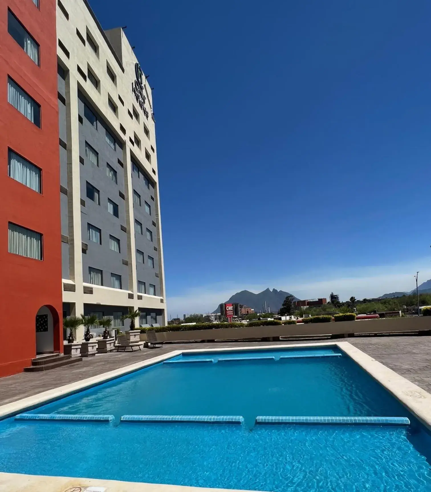 Swimming Pool in CHN Hotel Monterrey Norte, Trademark Collection by Wyndham