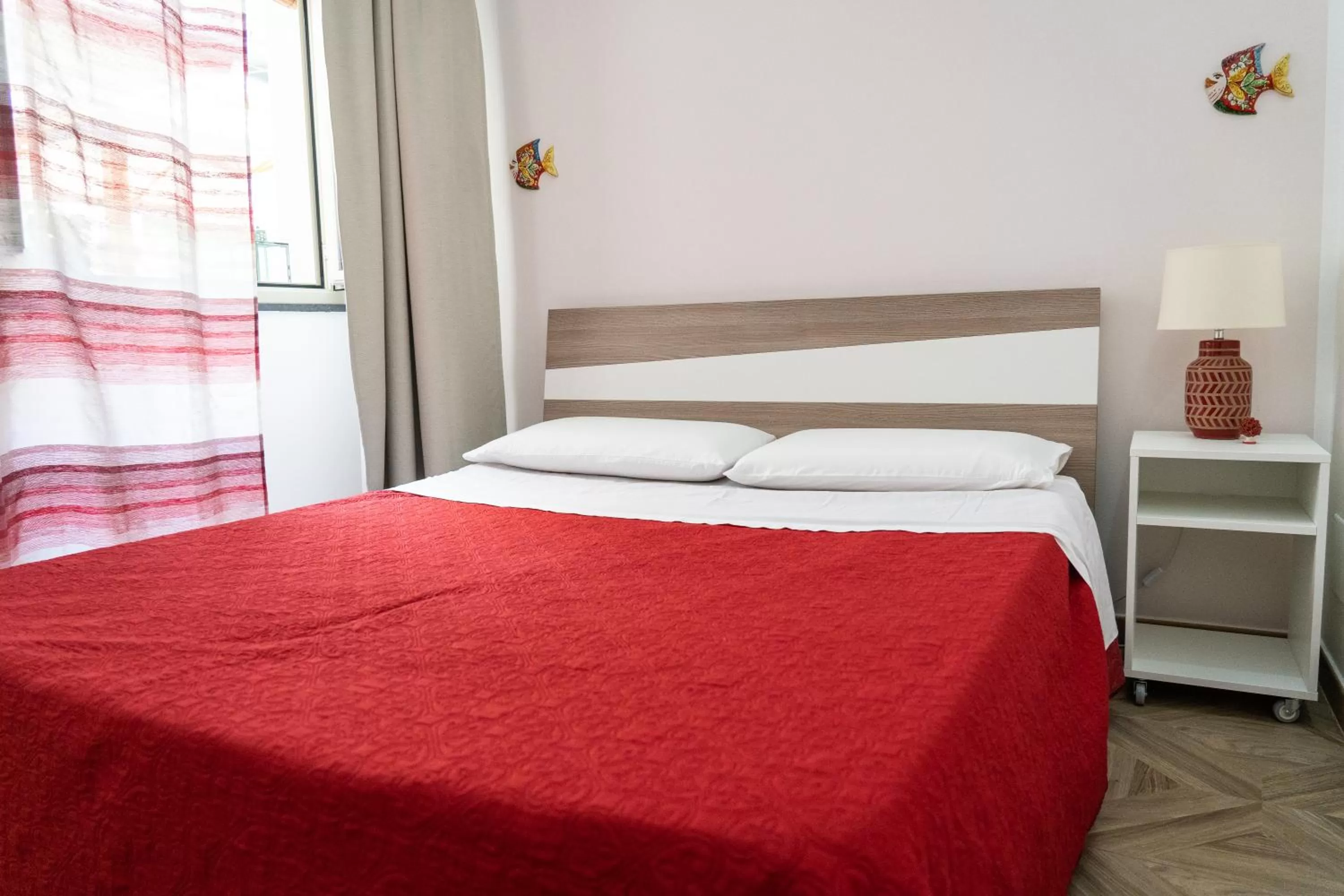 Bed in Portosalvo Rooms