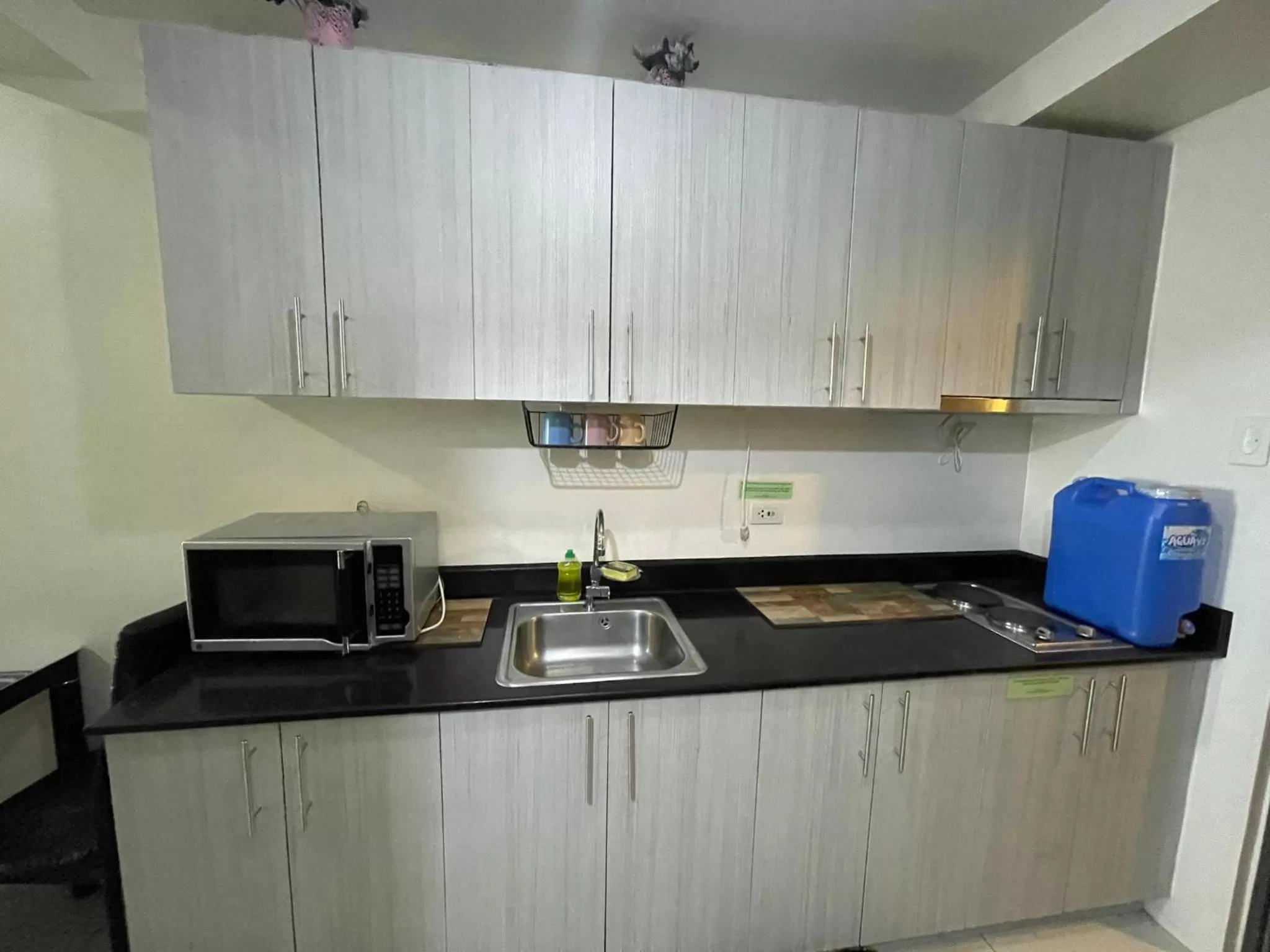 Kitchen or kitchenette, Kitchen/Kitchenette in Green Residences Staycation by PBYY