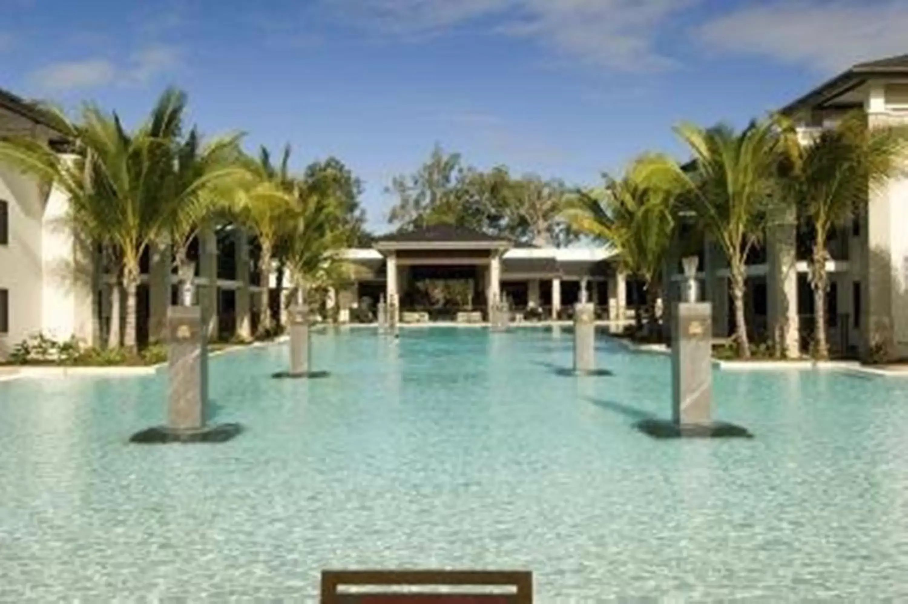 Swimming pool, Property Building in Pullman Port Douglas Sea Temple Resort and Spa