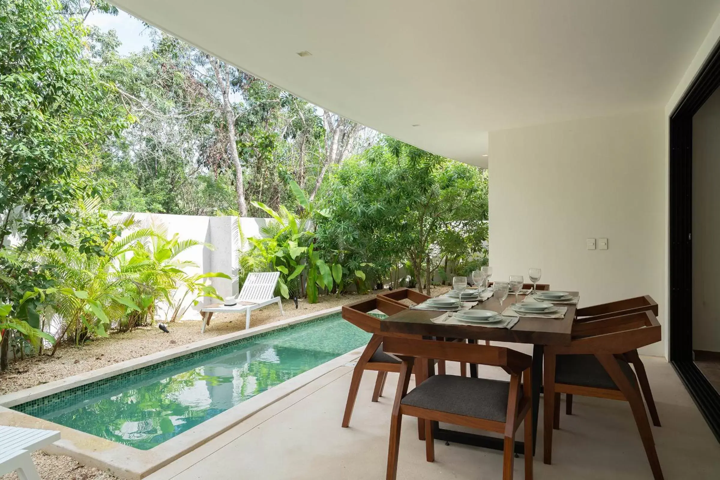 Dining area, Swimming Pool in Suites at TreeTops Tulum