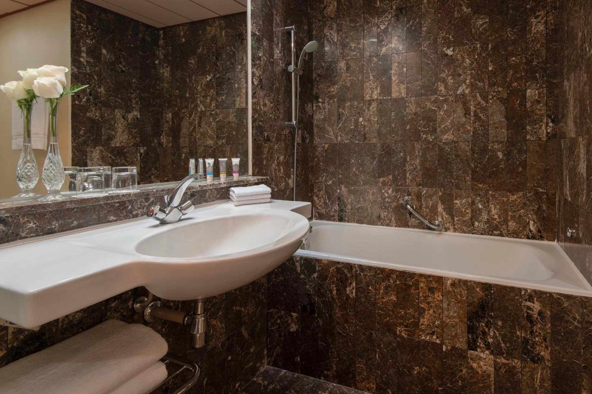 Pool view, Bathroom in M Grand Hotel Doha