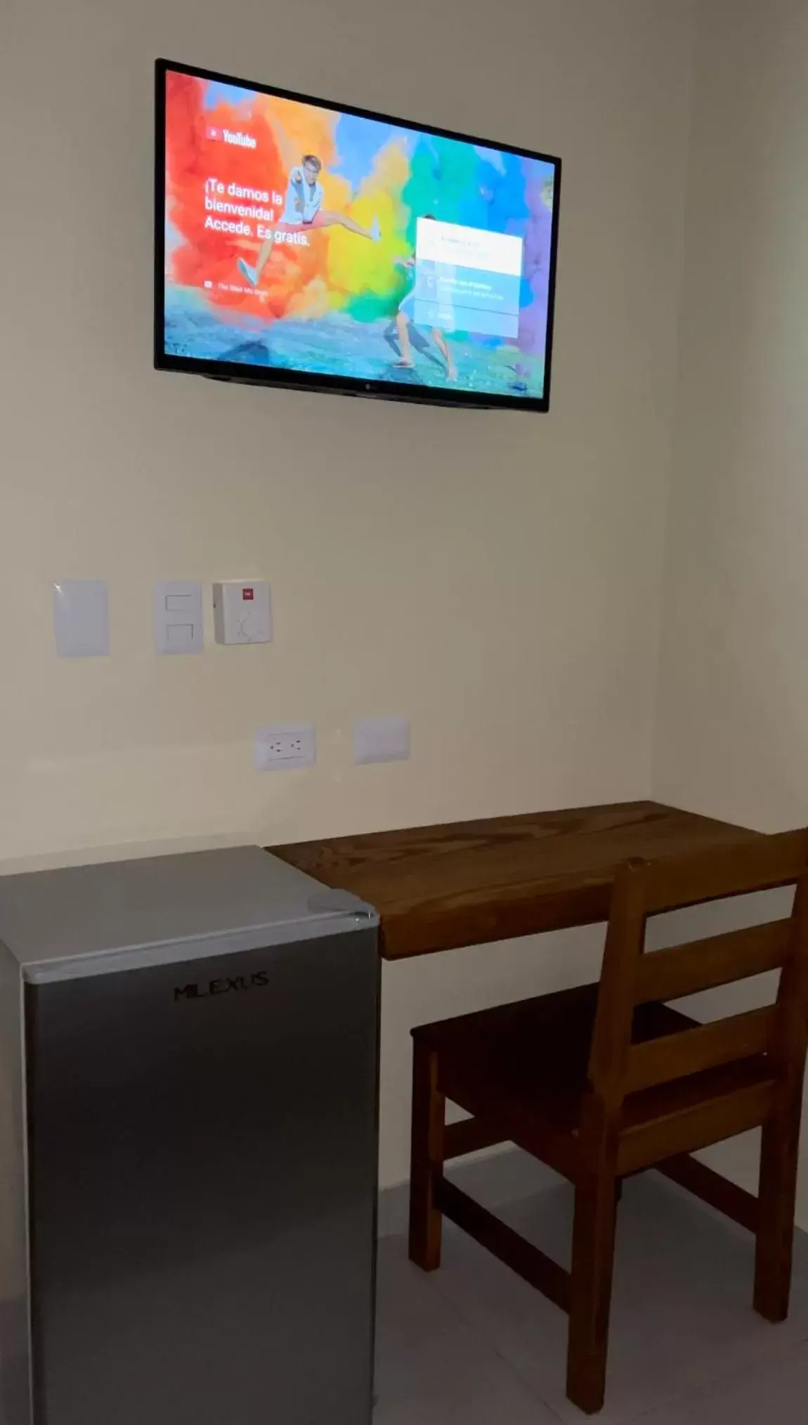 TV and multimedia, TV/Entertainment Center in Hotel Yamilí