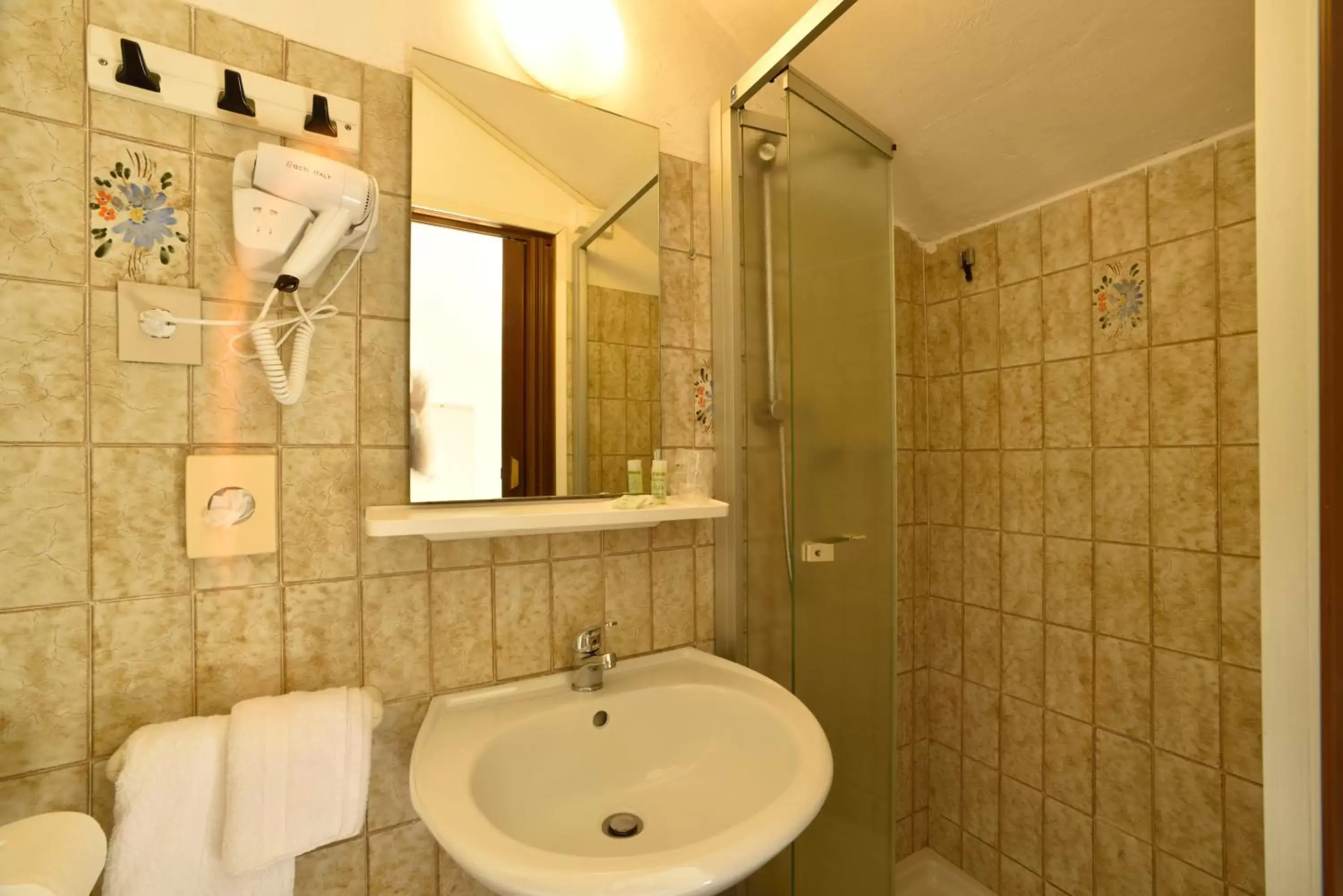Bathroom in Hotel Diano Marina Mhotelsgroup