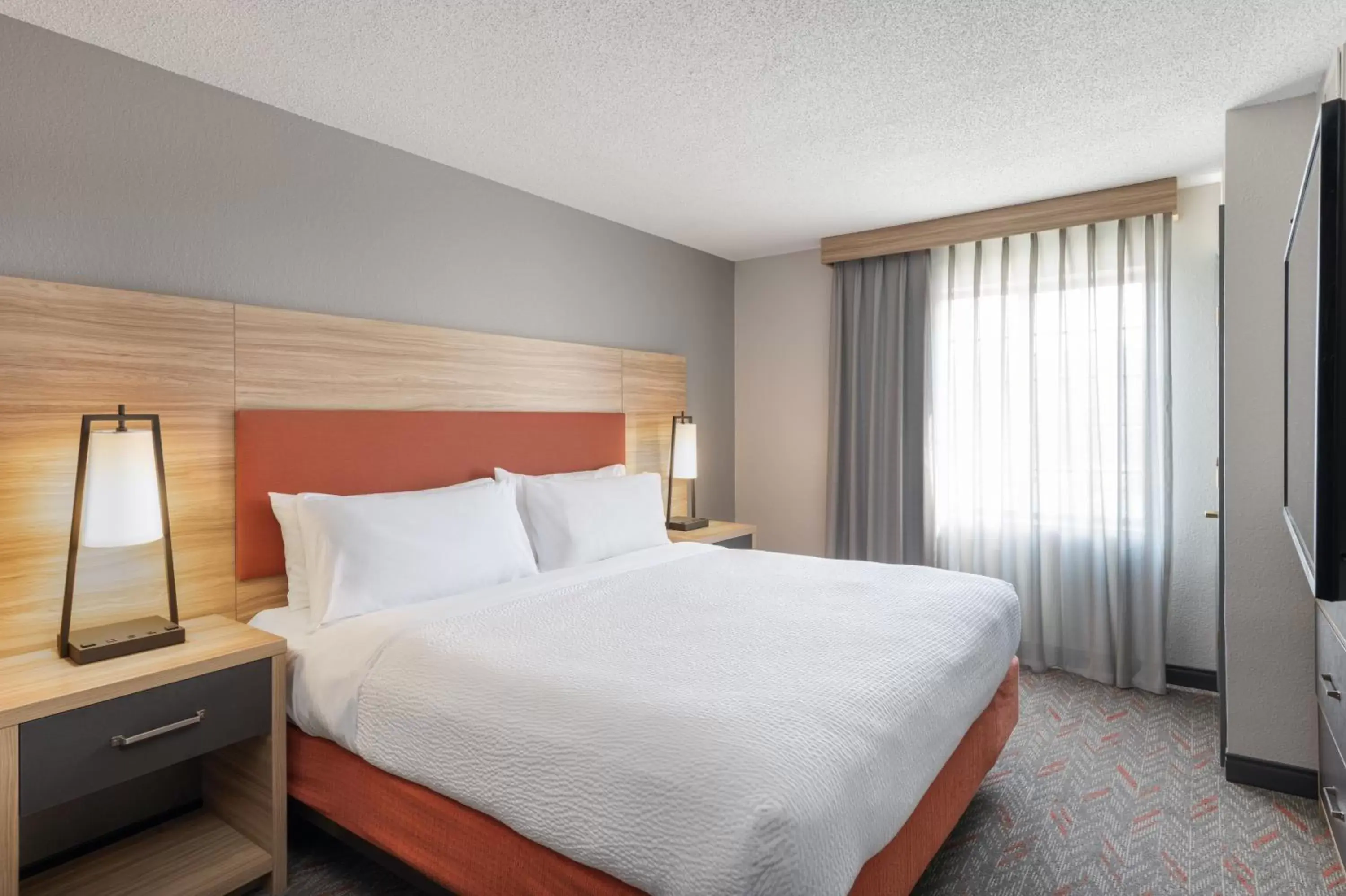 Bed in Candlewood Suites Eagan - Mall of America Area, an IHG Hotel