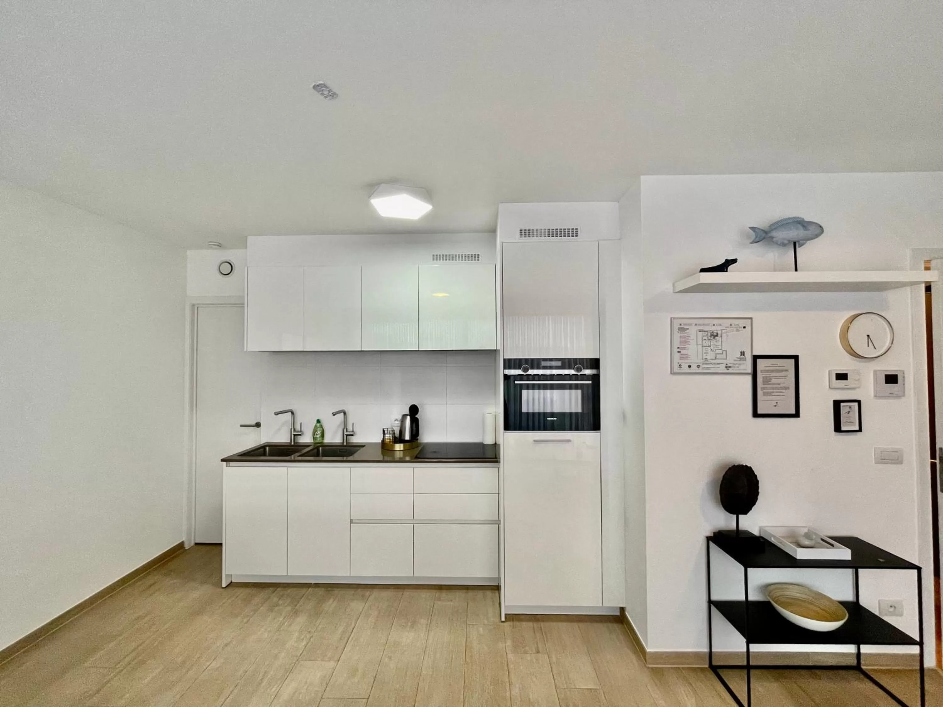 kitchen in OneLuxStay near Diamond District