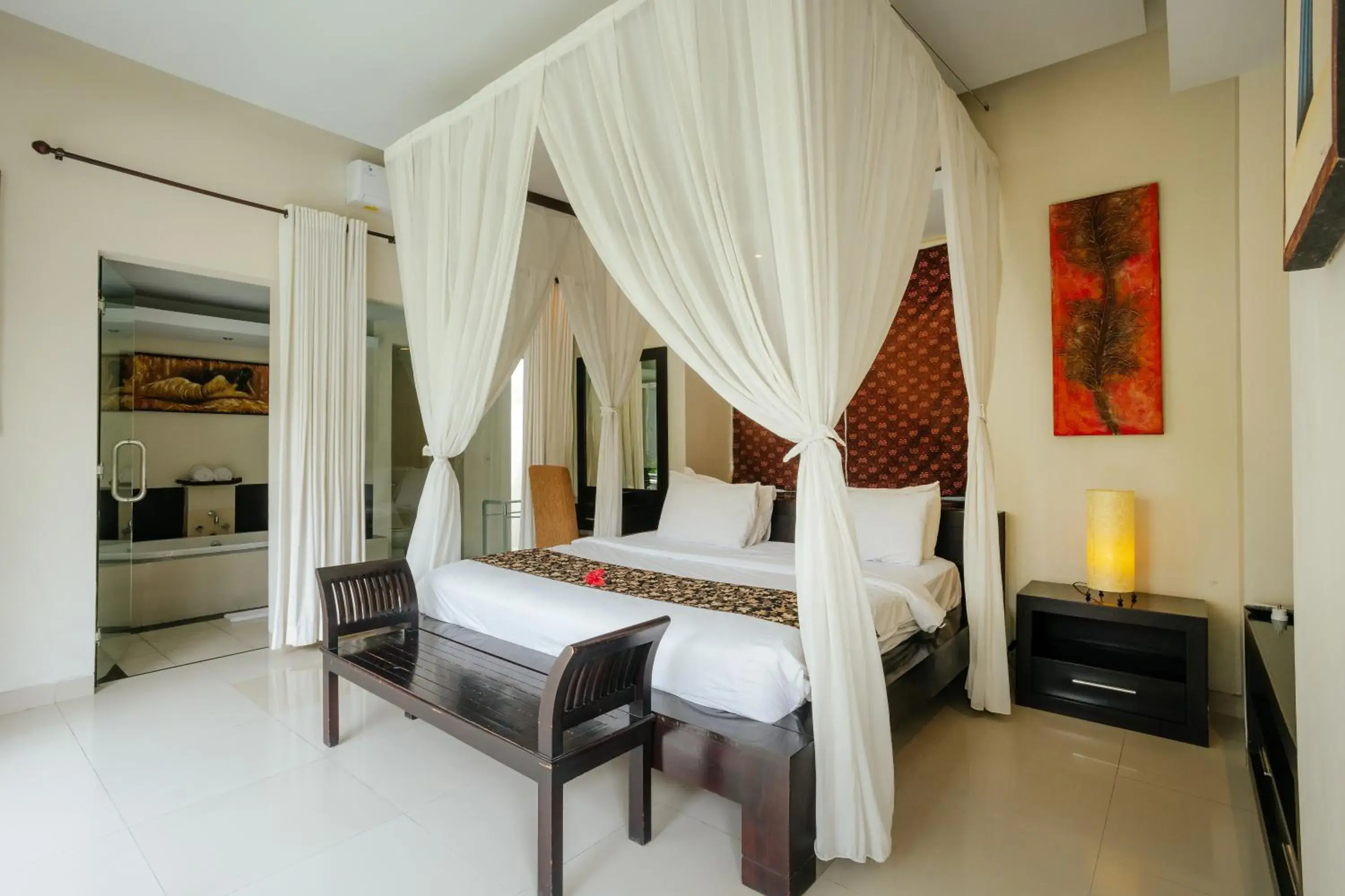 Bed in The Bidadari Villas and Spa