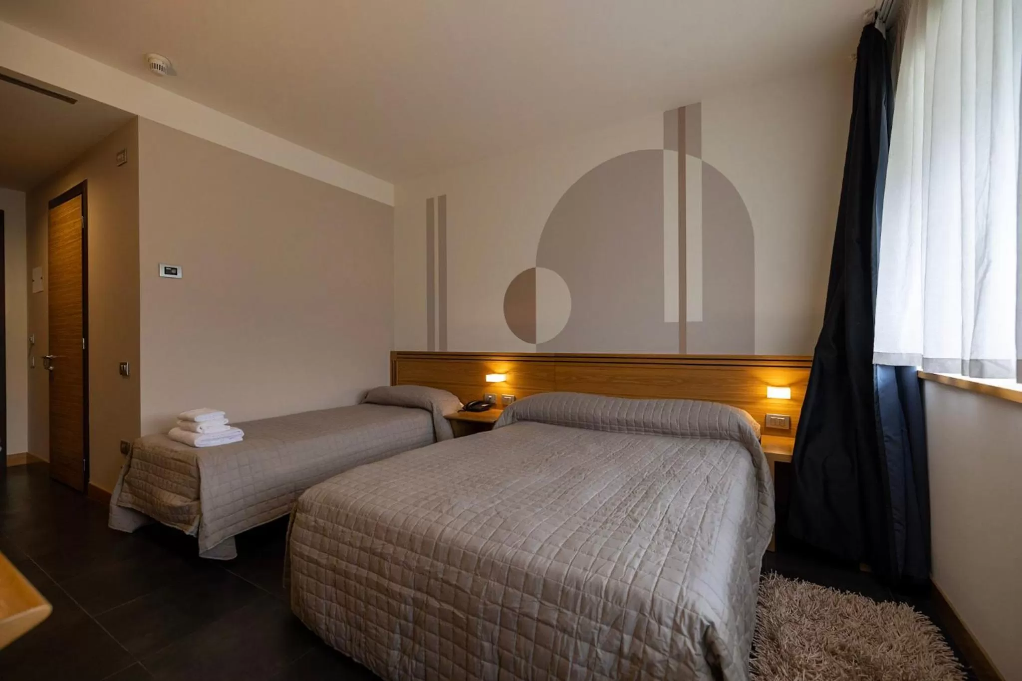 Bed in Hotel Europa Belluno