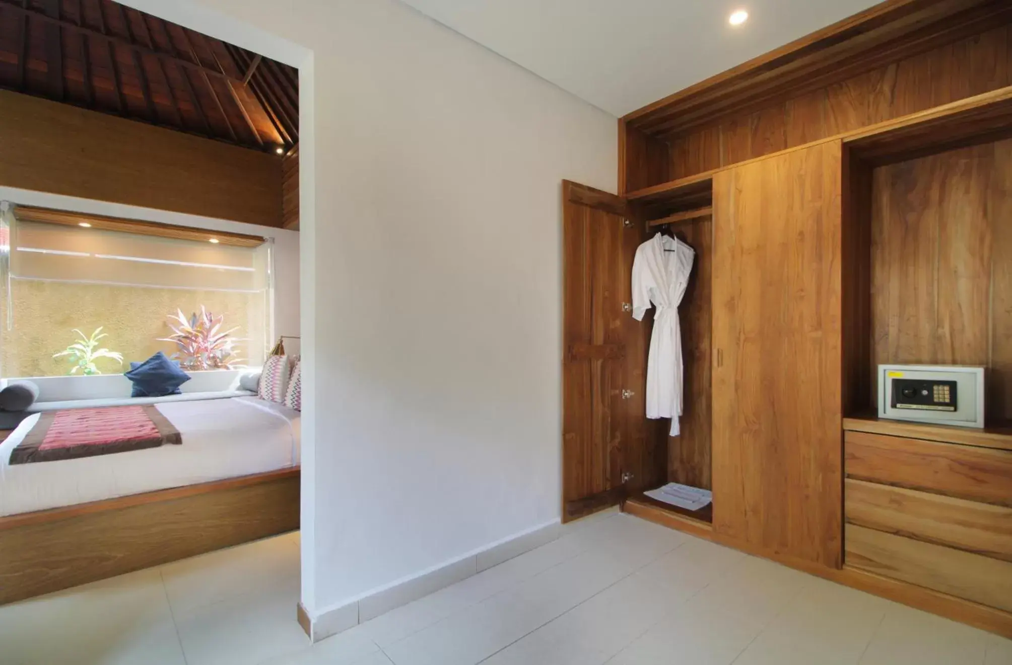 wardrobe, Bed in Sagara Villas and Suites Sanur